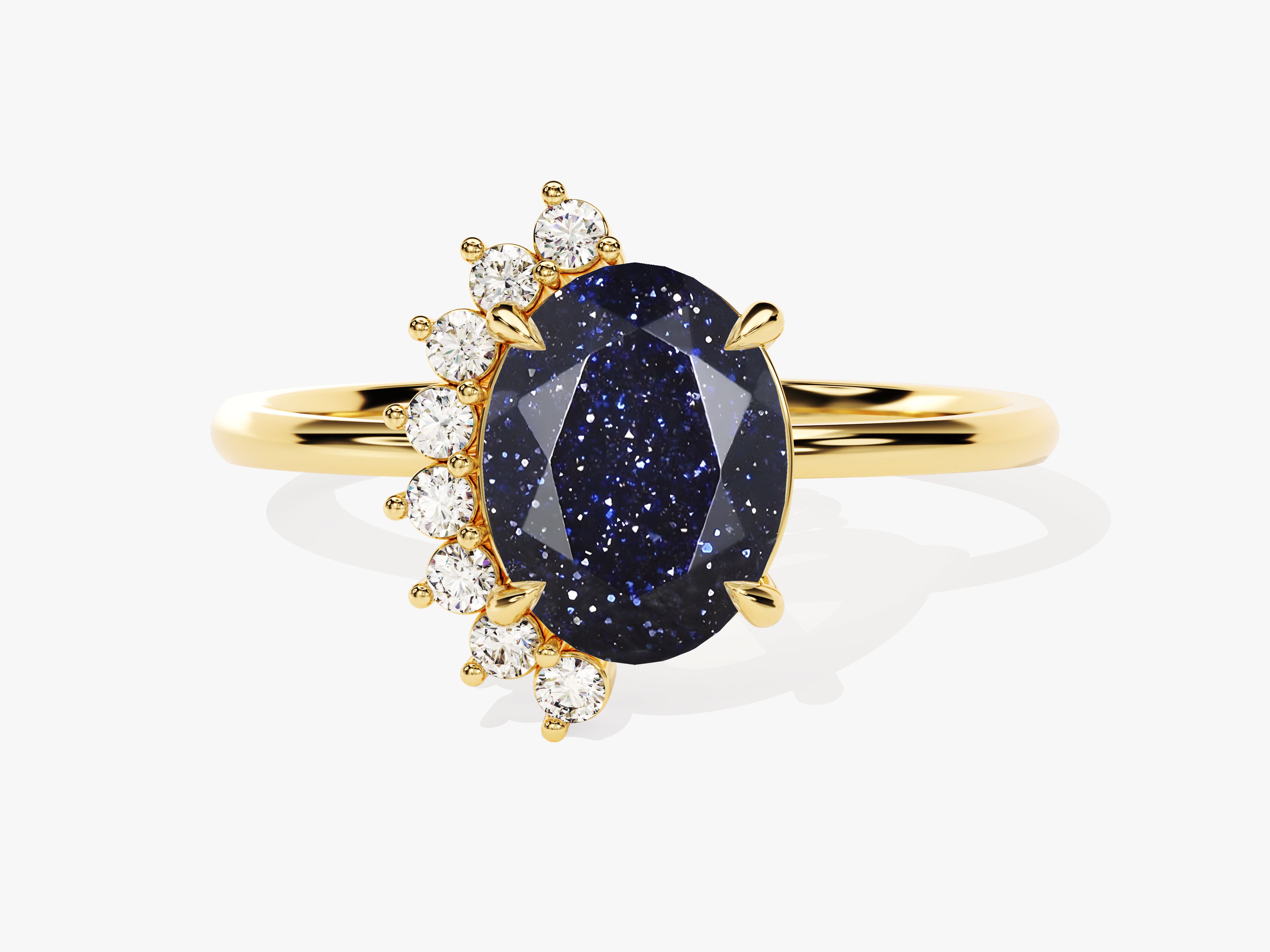 Gold ring with oval blue sandstone and diamond accents