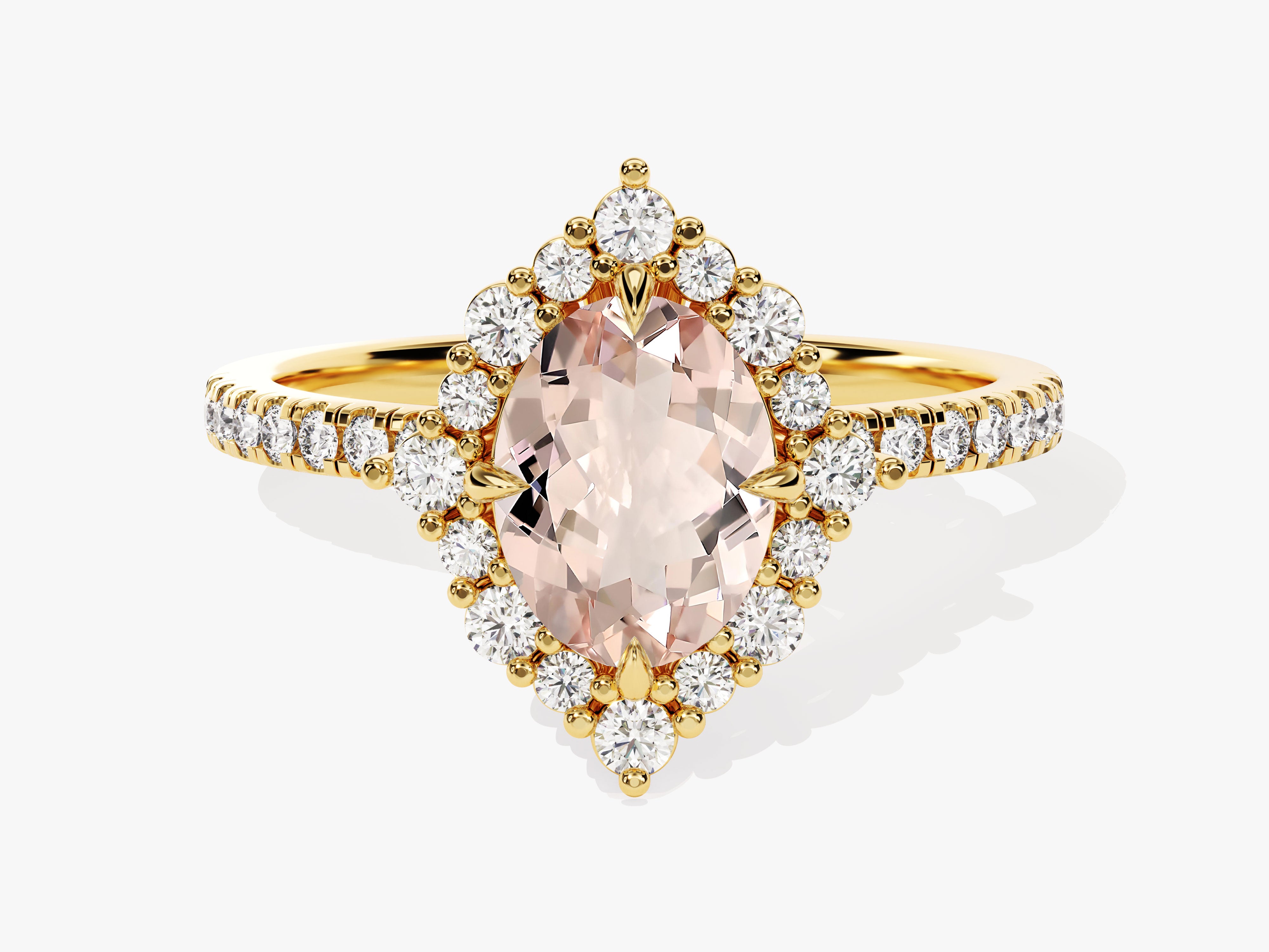Gold marquise engagement ring with diamonds and pink center stone