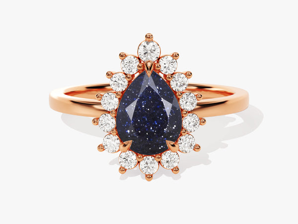 Rose gold ring with pear-shaped blue sandstone and diamond halo
