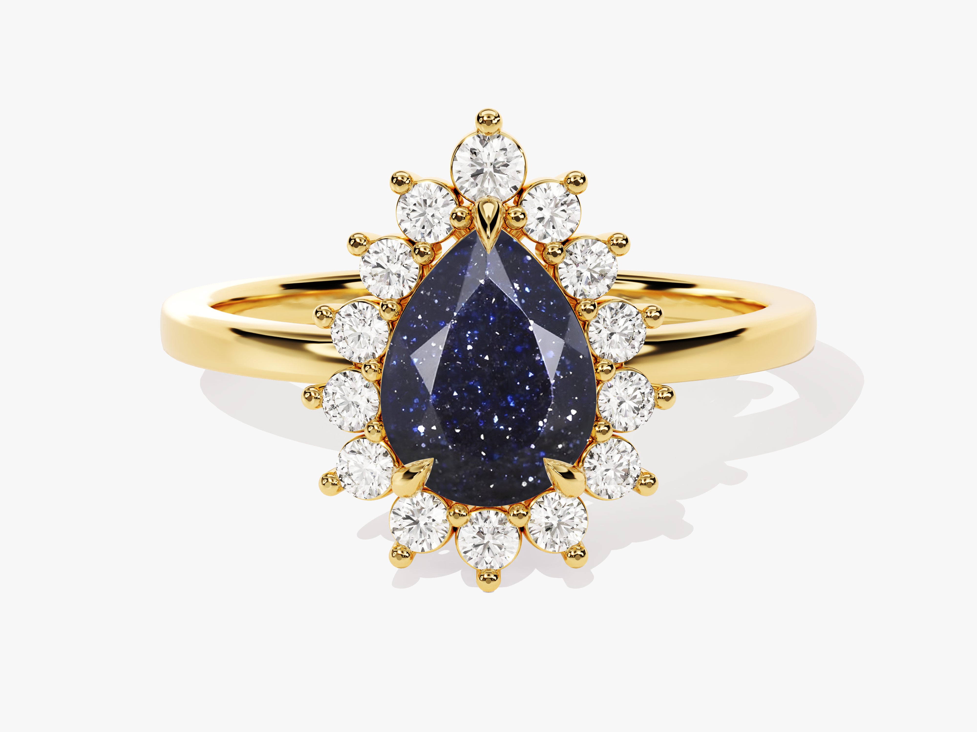 Gold ring with pear-shaped blue sandstone and diamond halo