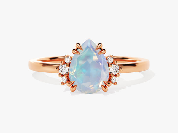 Rose gold pear-shaped opal and diamond engagement ring