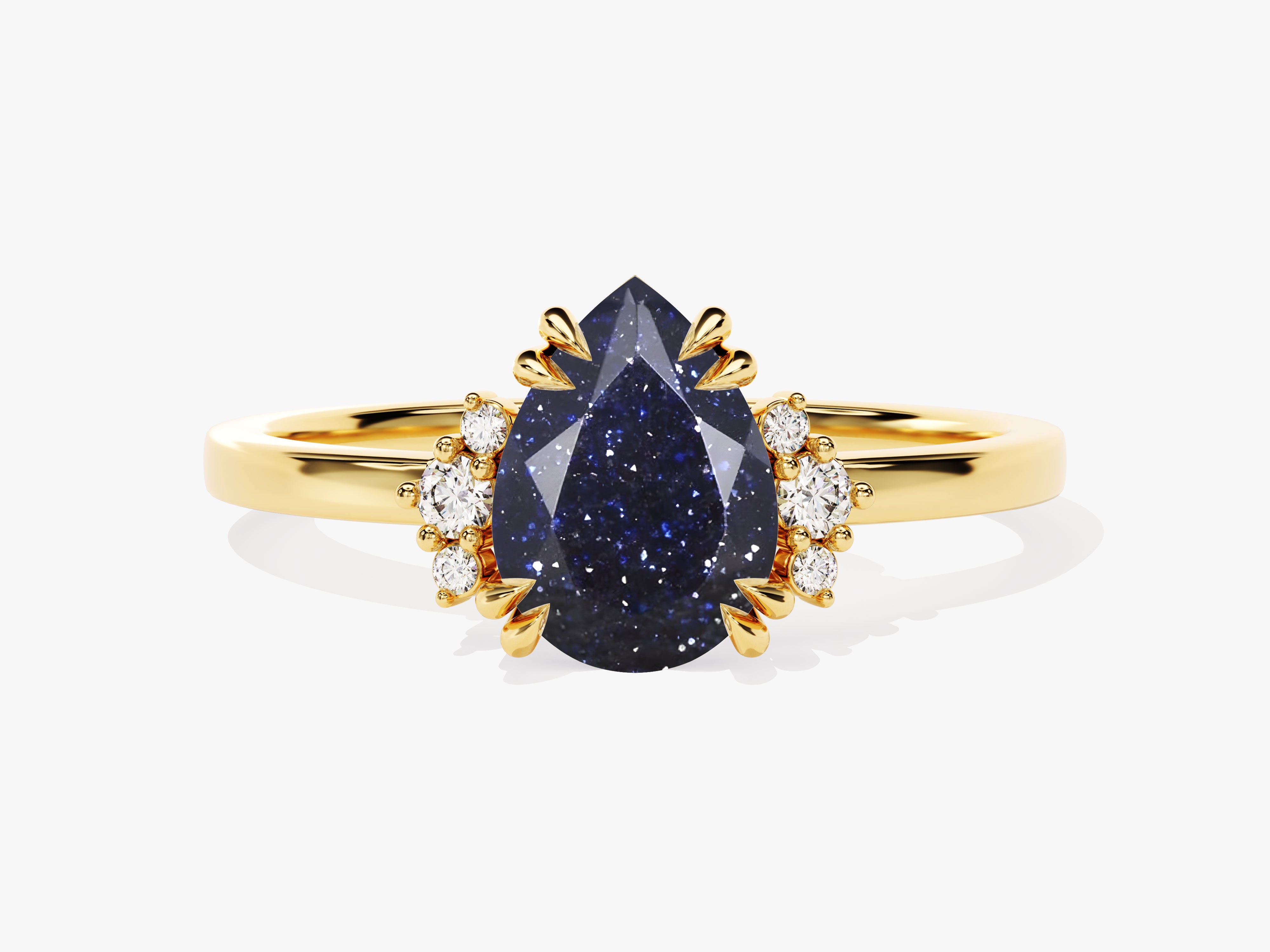 Gold ring with pear-shaped blue sandstone and diamond accents