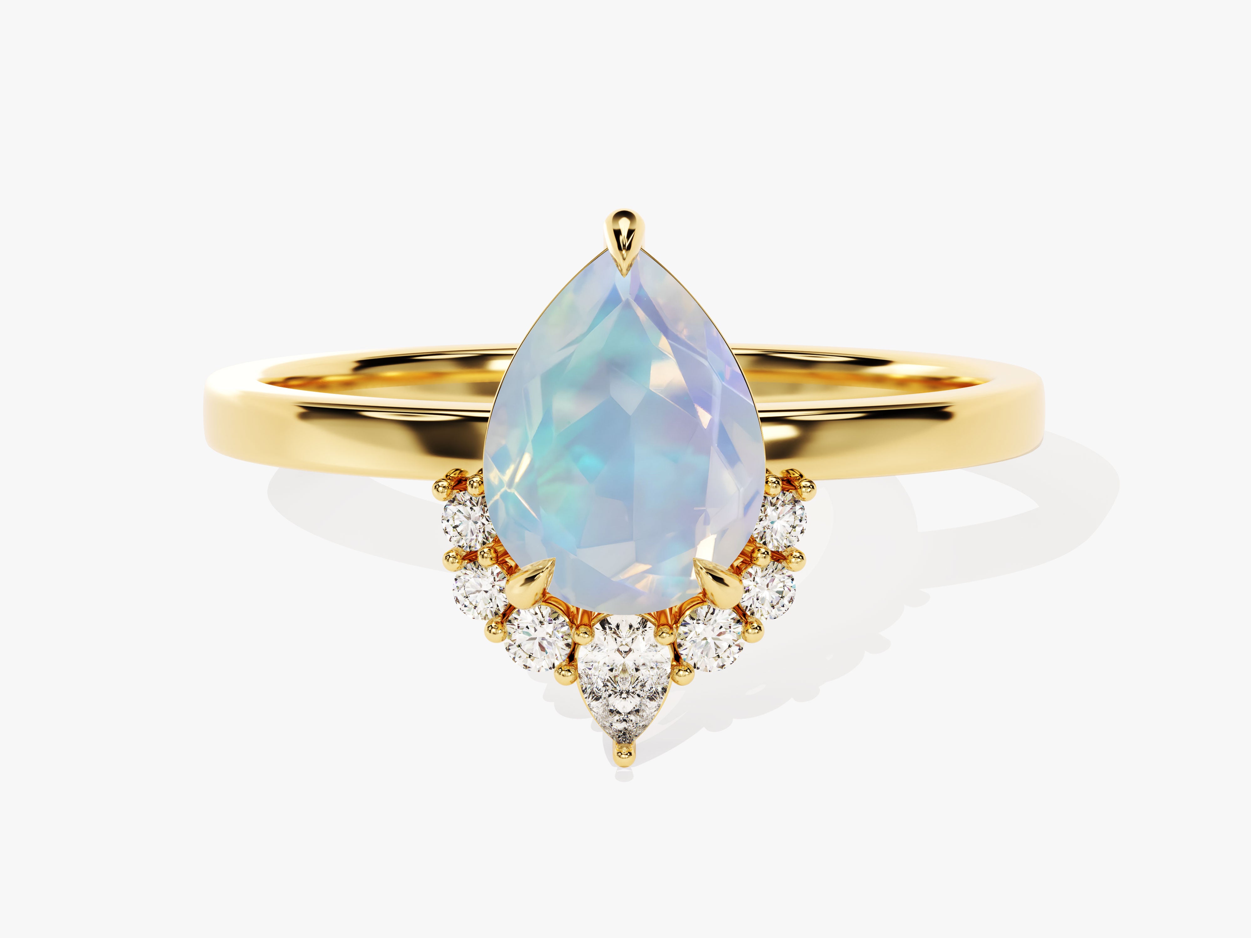 Gold ring with pear-shaped opal and diamond accents
