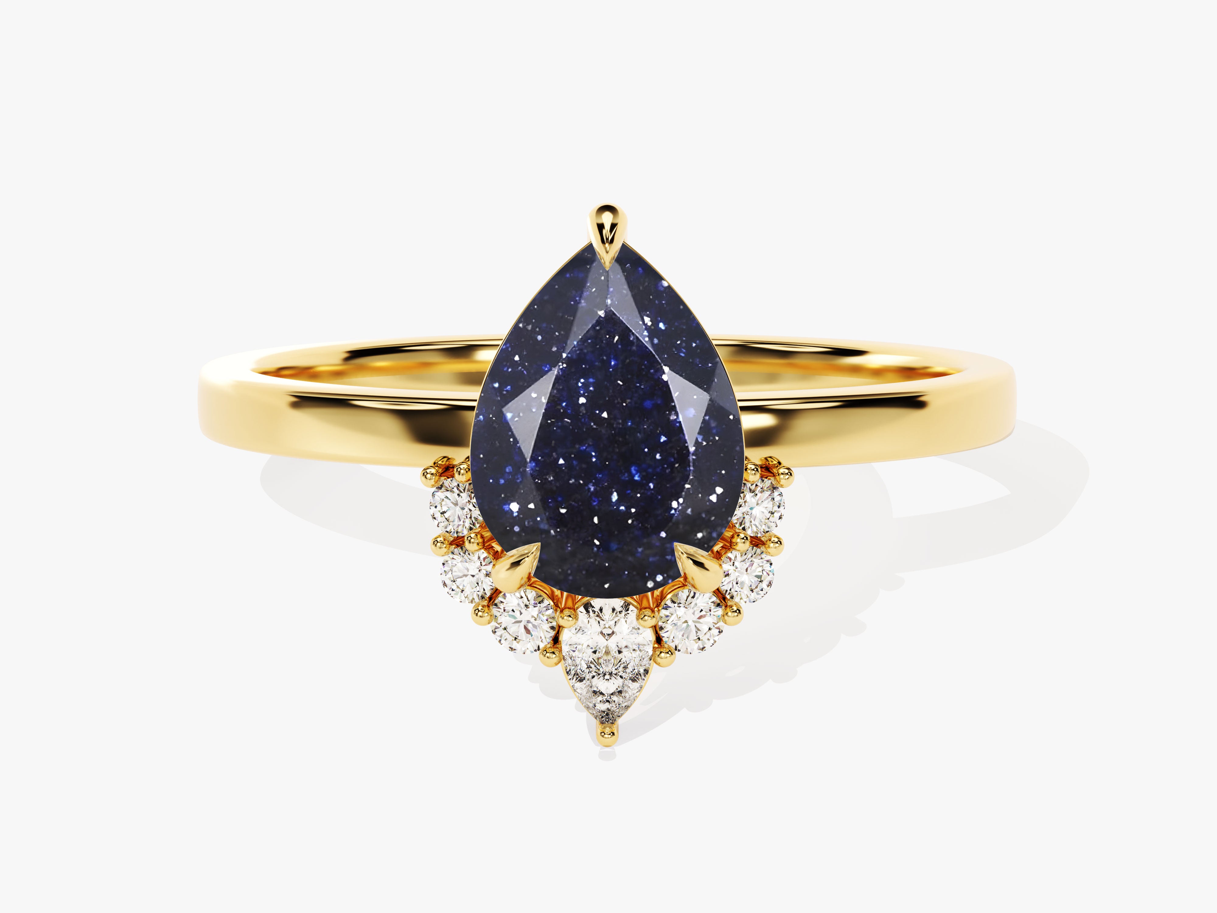 Gold ring with pear-shaped blue sandstone and diamond accents