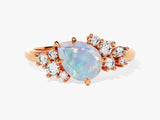 Pear Opal Engagement Ring with Round Moissanite Cluster