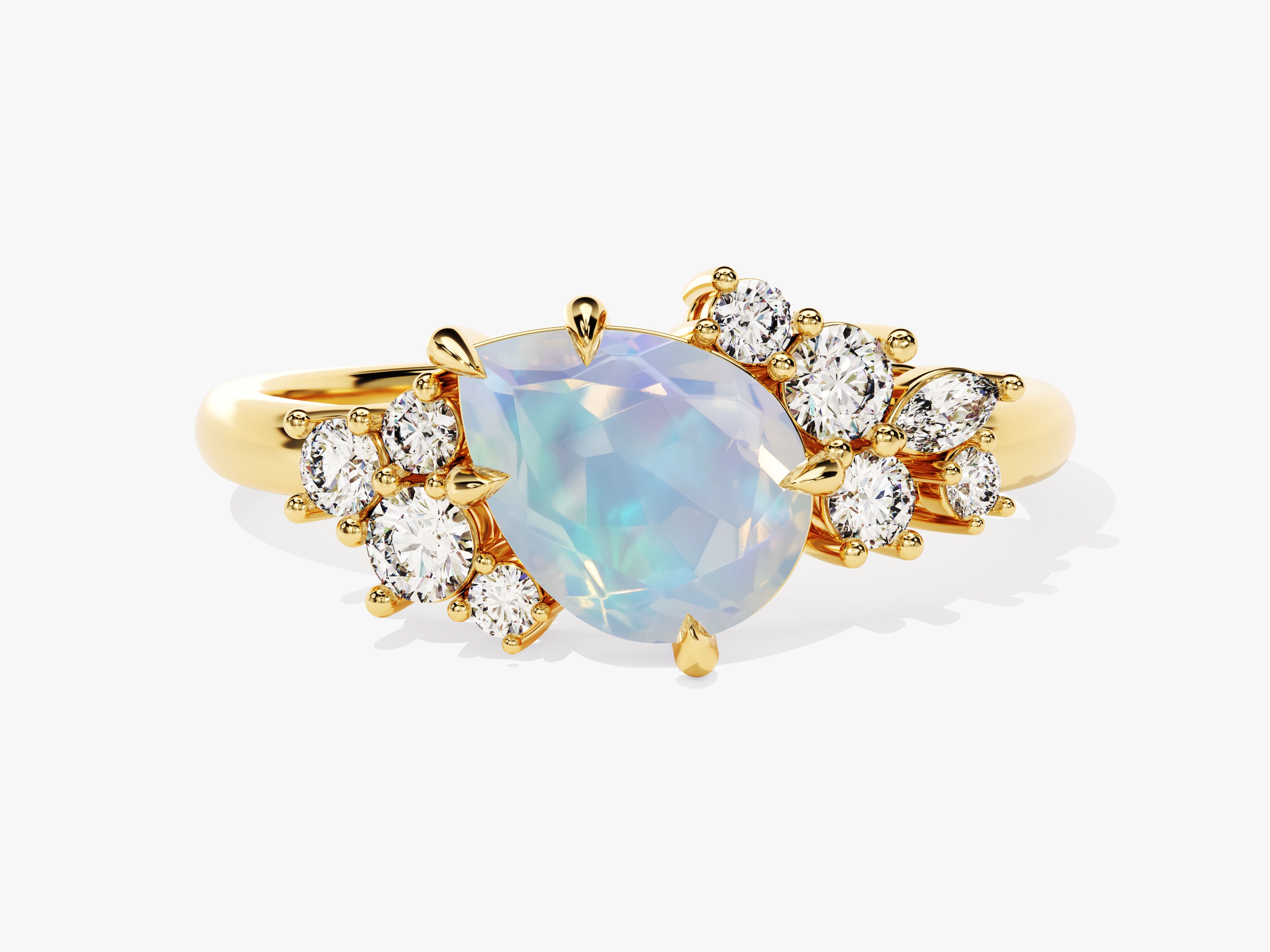 Gold ring with pear-shaped opal and diamond accents