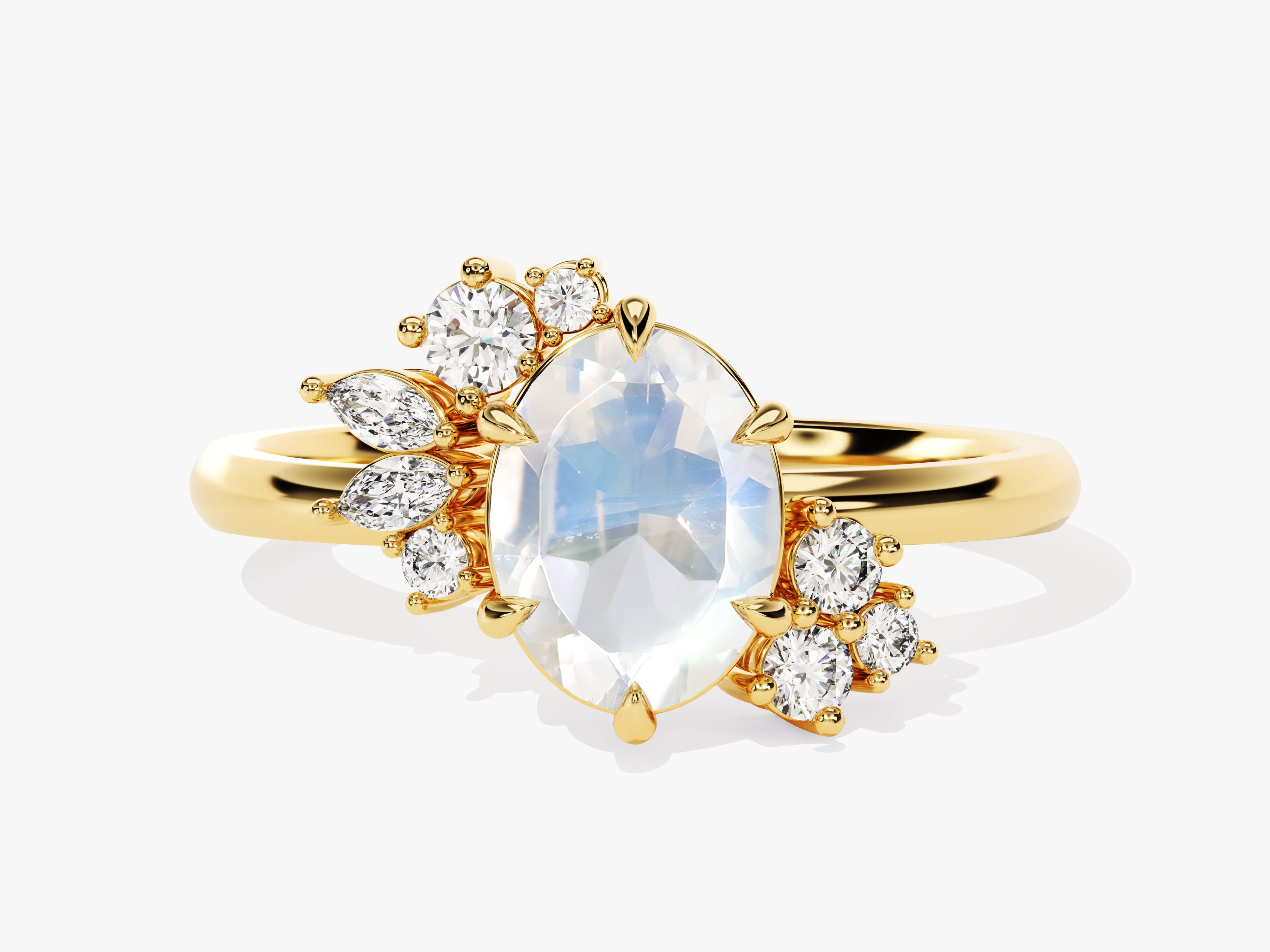 Gold ring with marquise and round diamonds and a moonstone