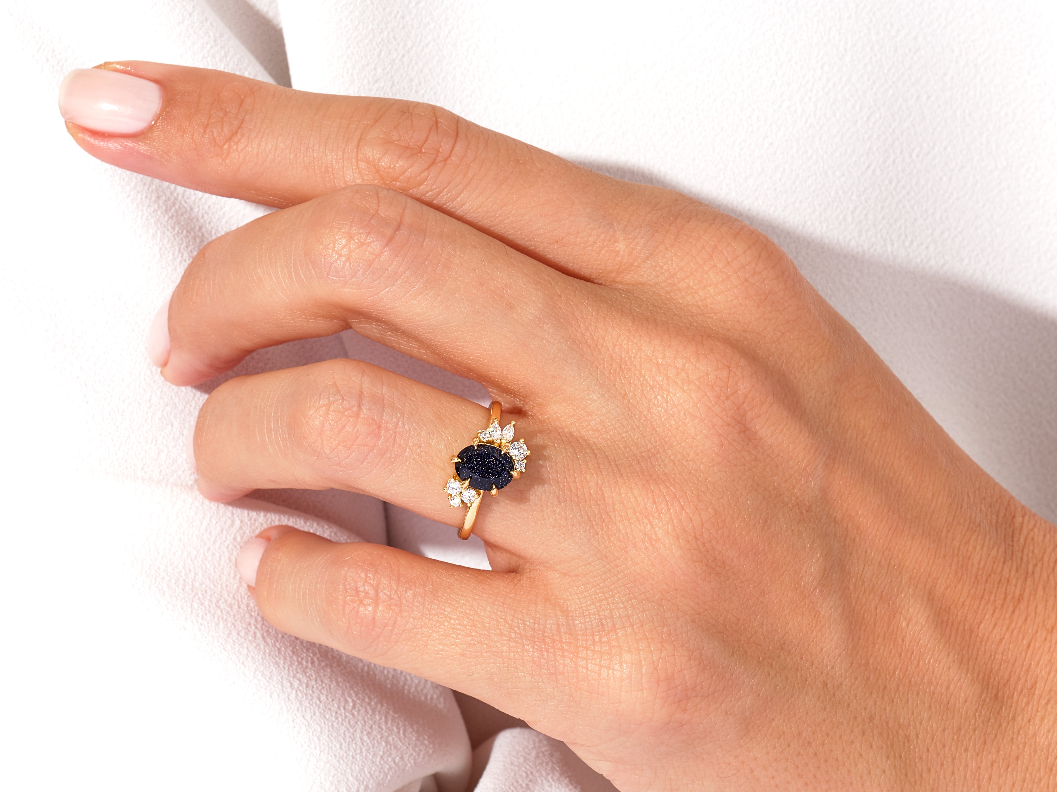 Oval Blue Sandstone Engagement Ring with Round Moissanite Cluster