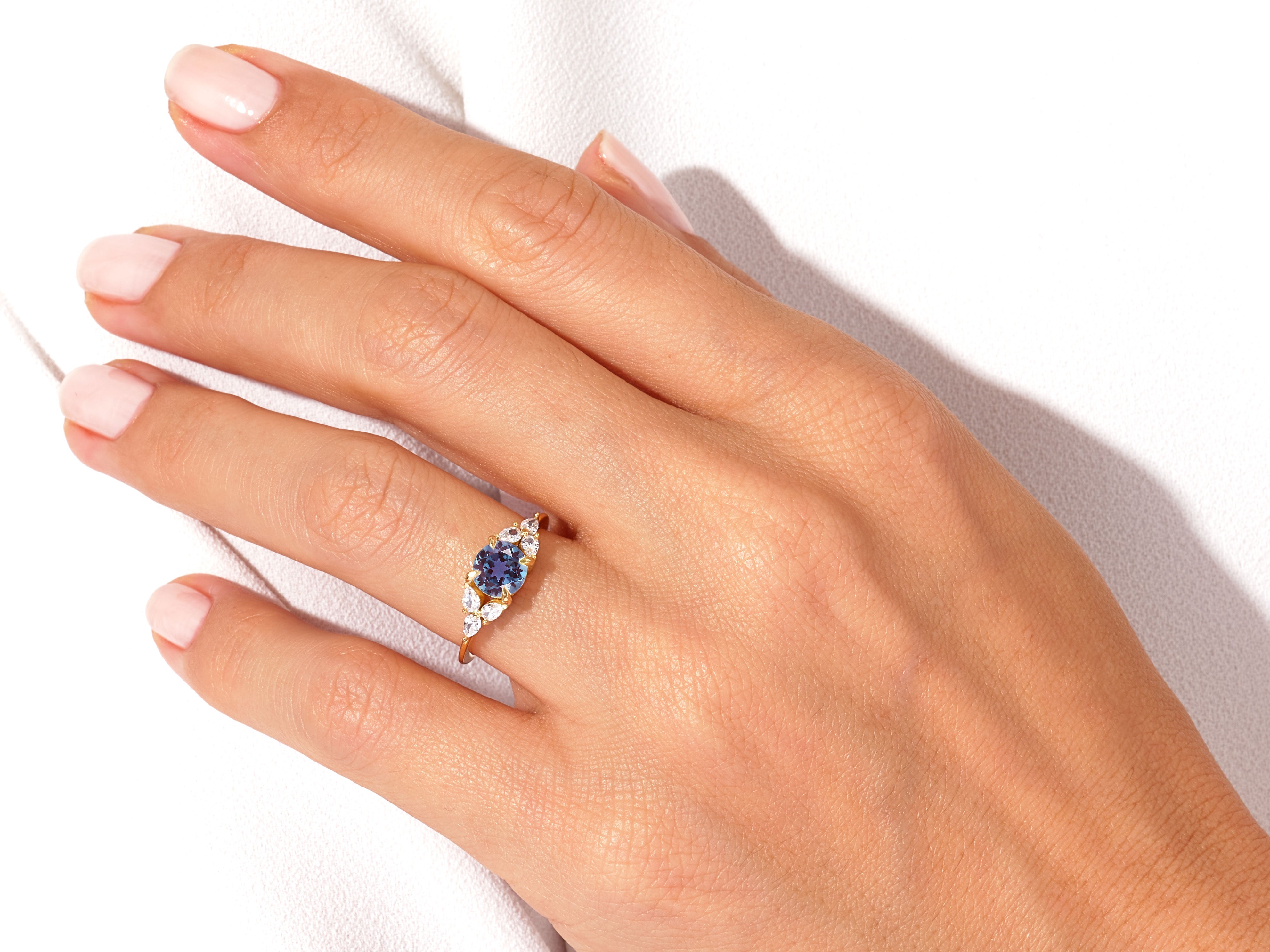 Round Lab Alexandrite Engagement Ring with Pear Moissanite Sidestones