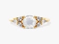 Round Moonstone Engagement Ring with Pear Moissanite Sidestones