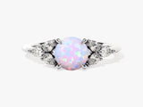 Round Opal Engagement Ring with Pear Moissanite Sidestones