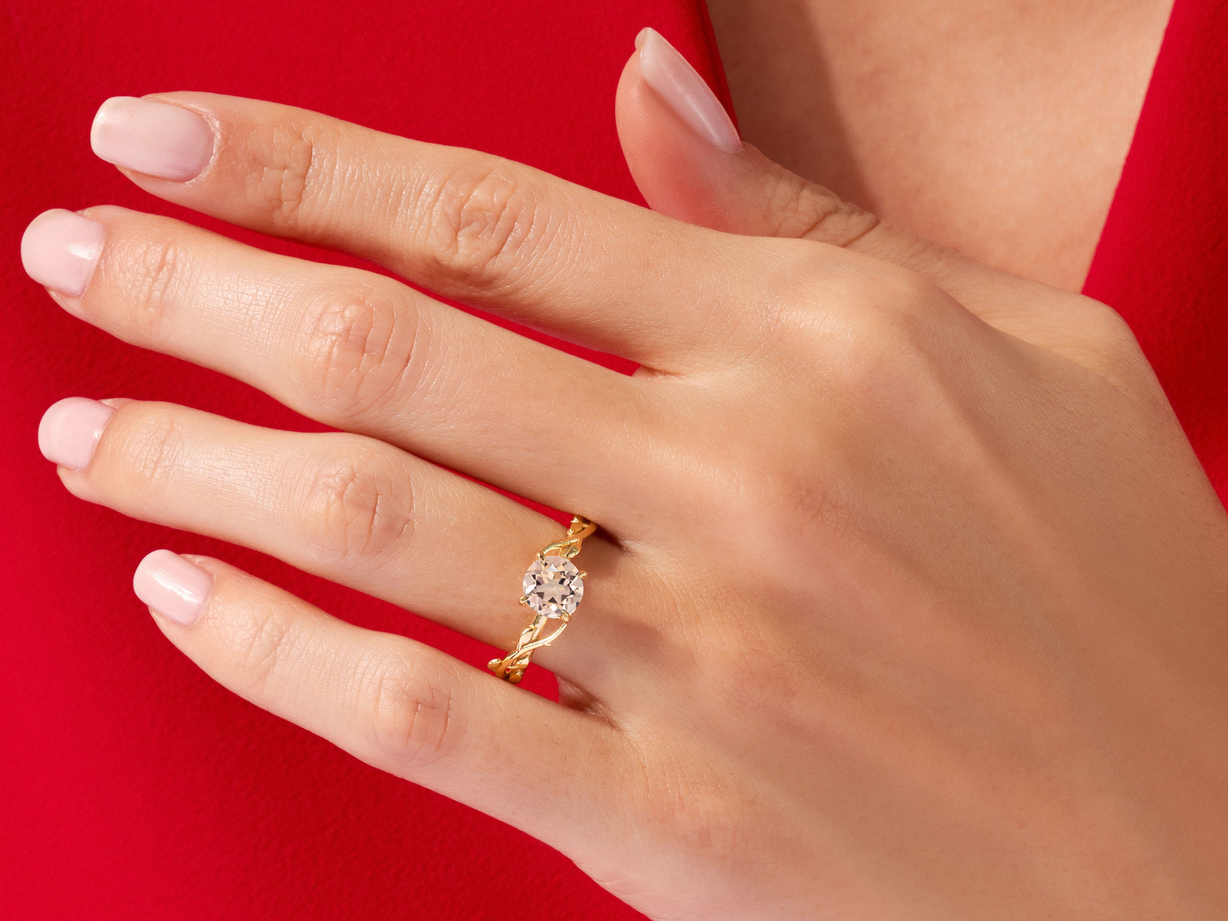 Gold diamond ring on a hand, jewelry photography