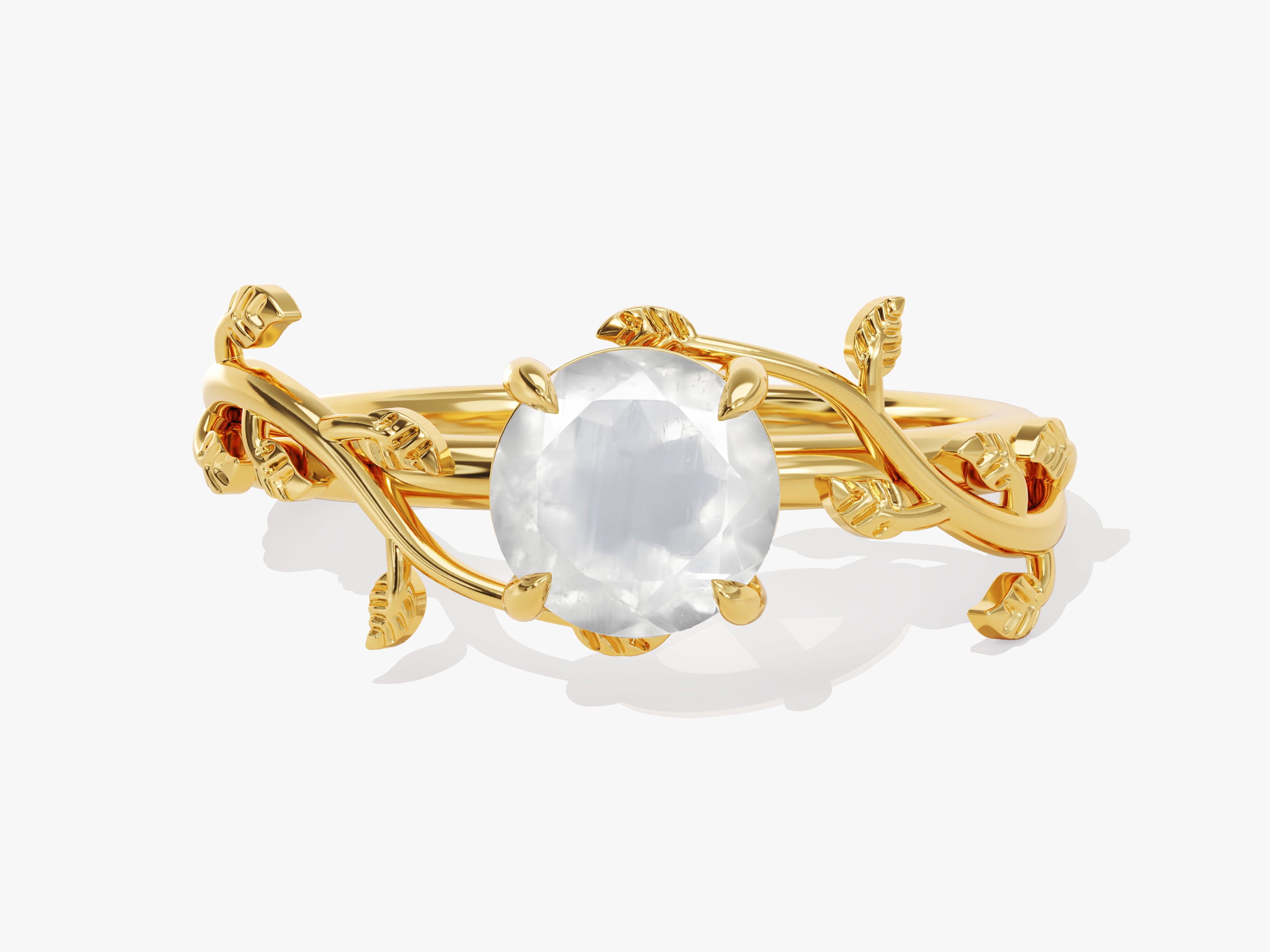 Gold ring with oval gemstone and leaf design, fine jewelry