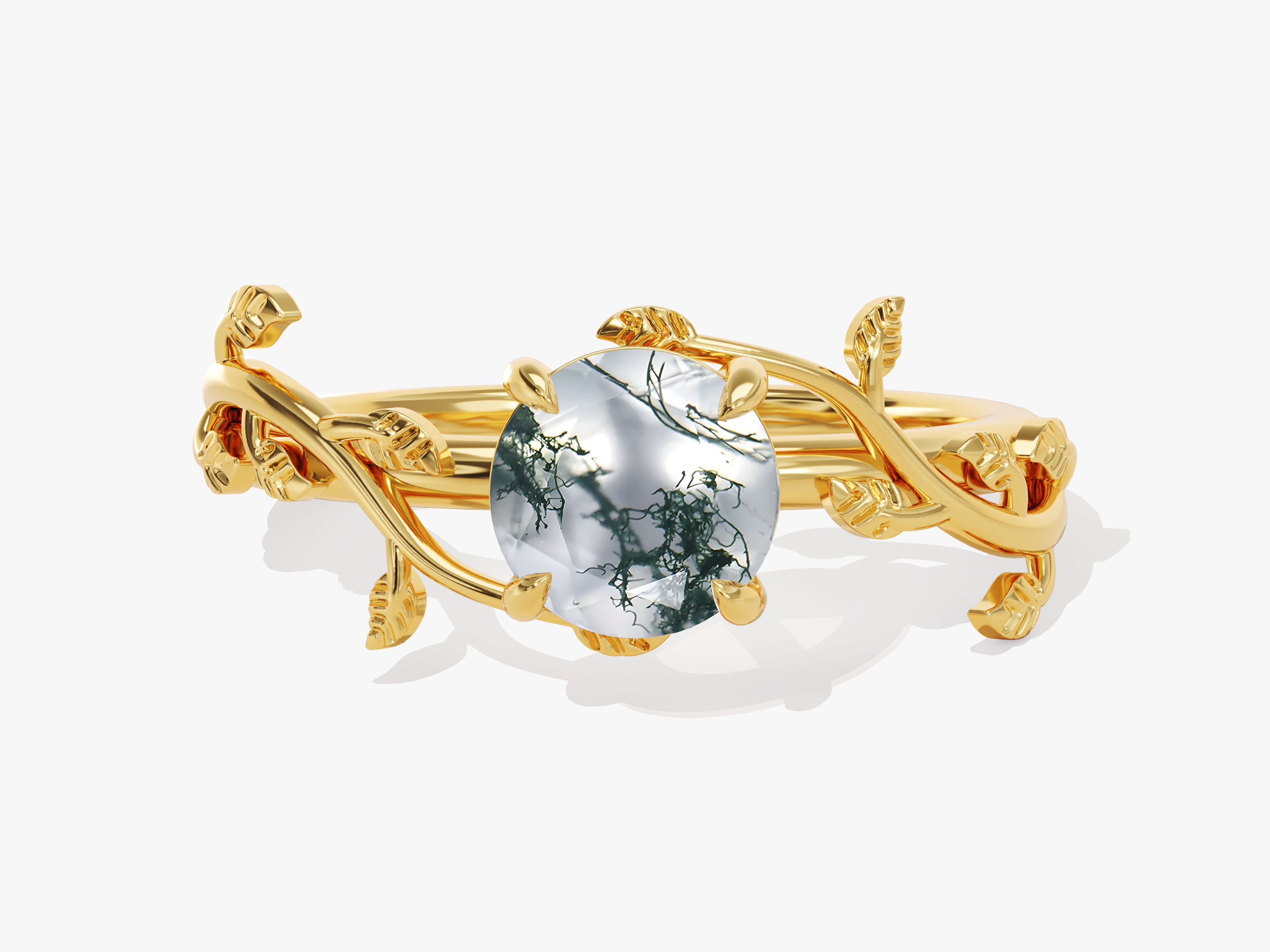 Gold ring with moss agate gemstone and leaf design