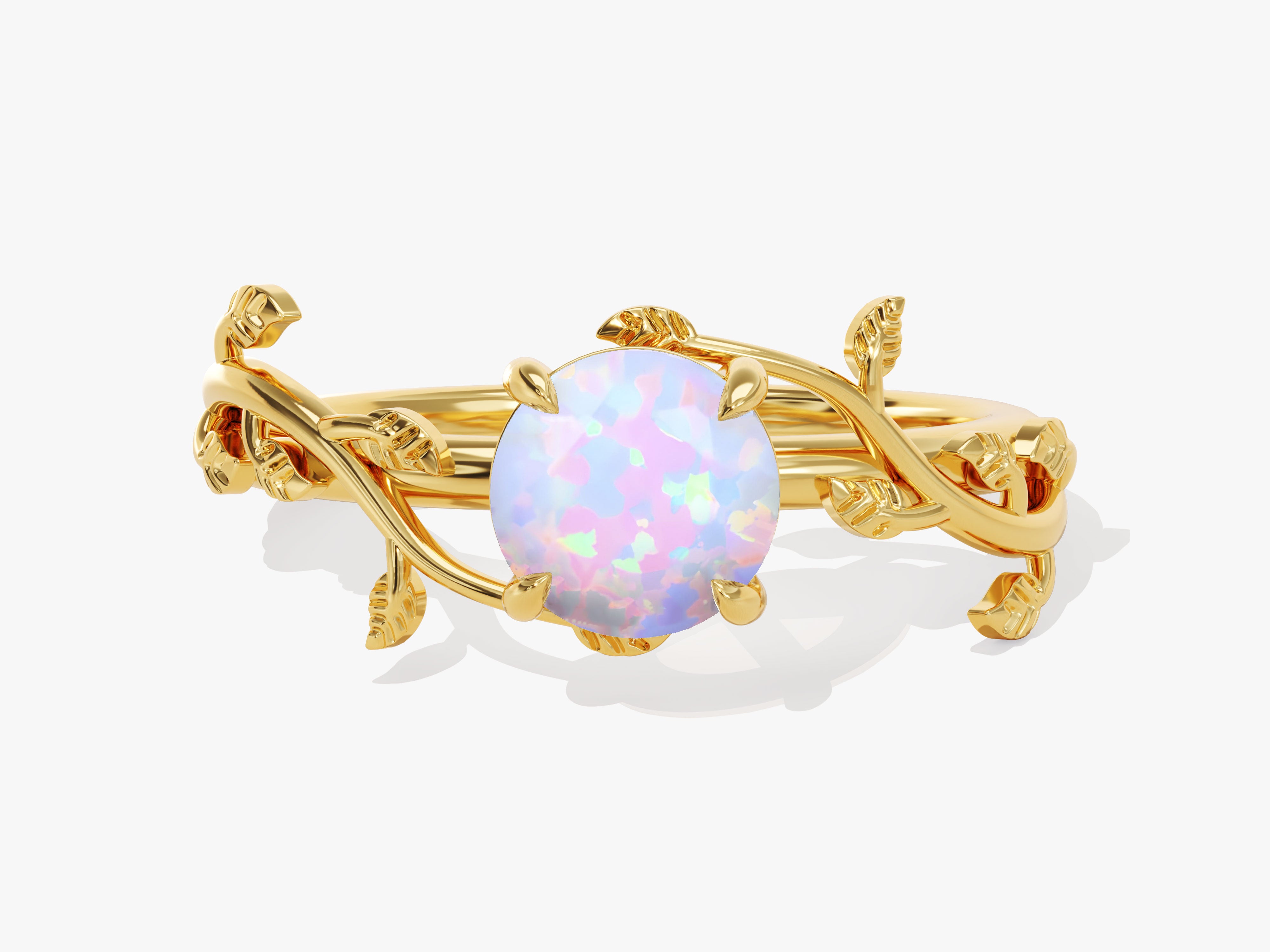 Gold ring with opal and leaf design, fine jewelry