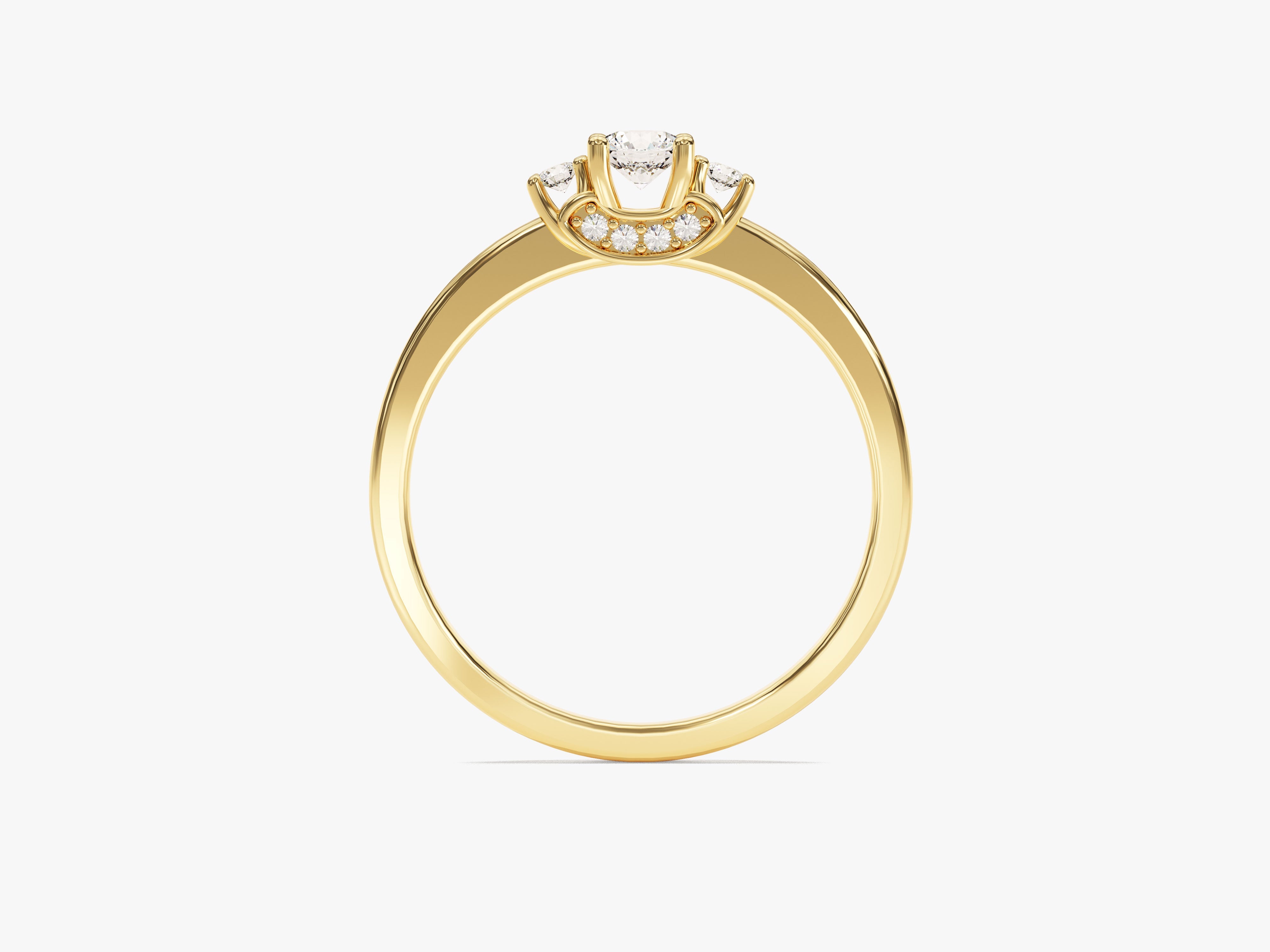 Gold diamond engagement ring with three center stones