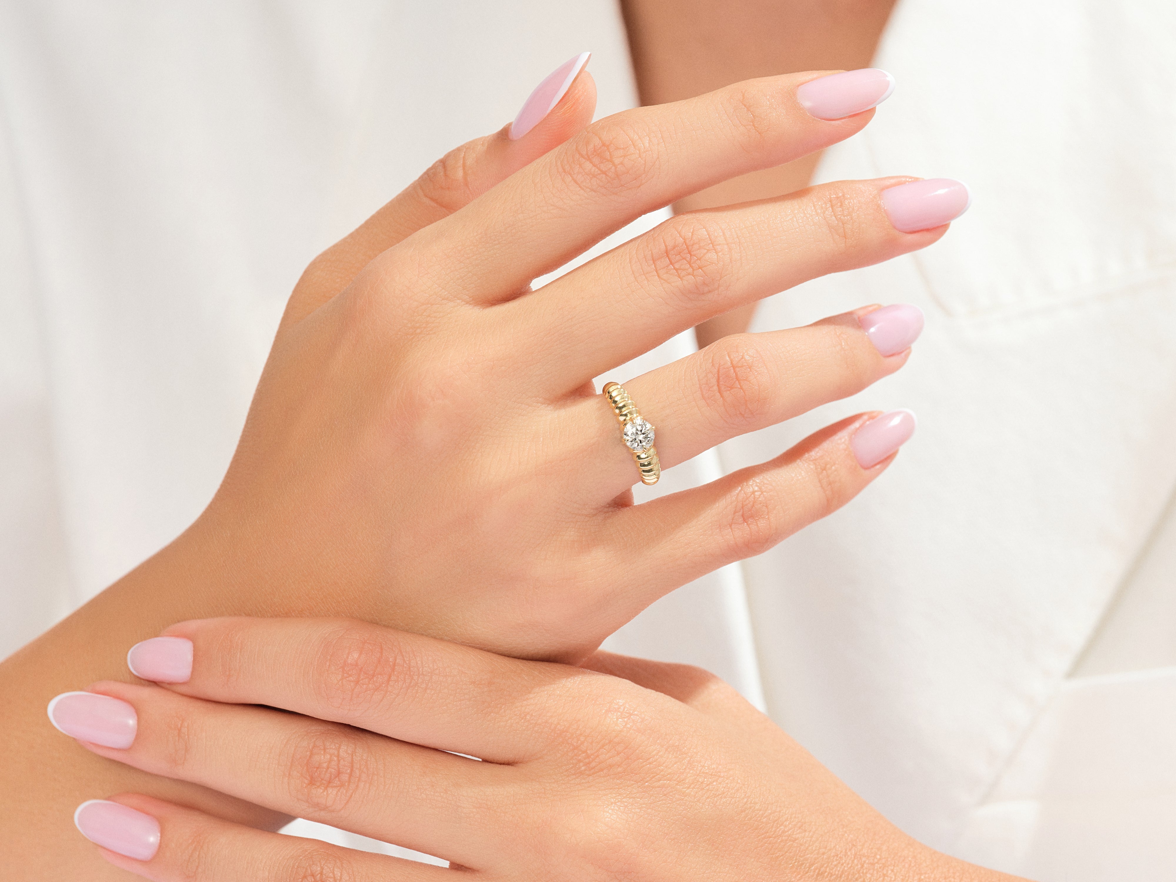 Gold beaded band ring with diamond solitaire, jewelry