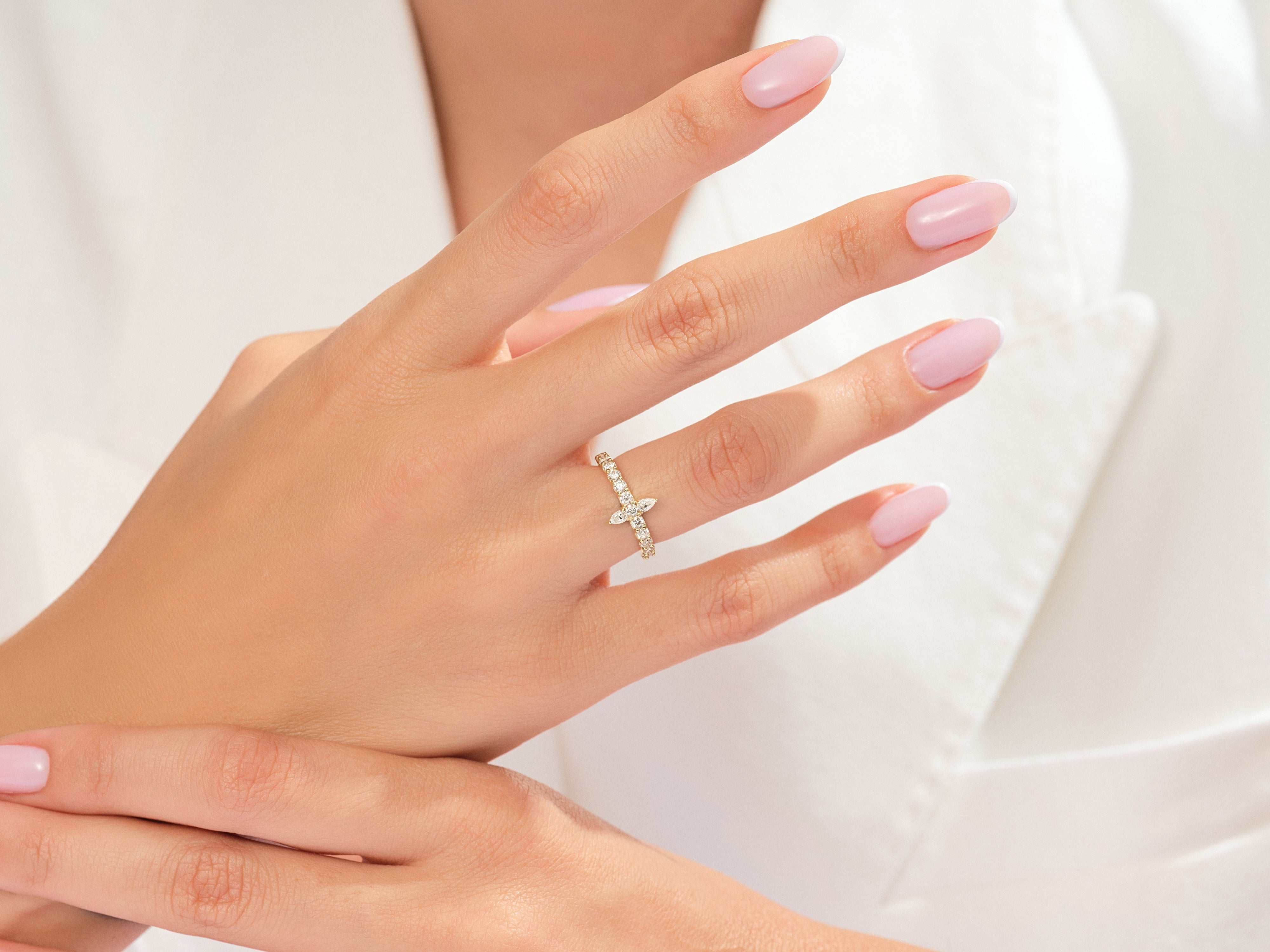 Diamond butterfly ring on a woman's hand