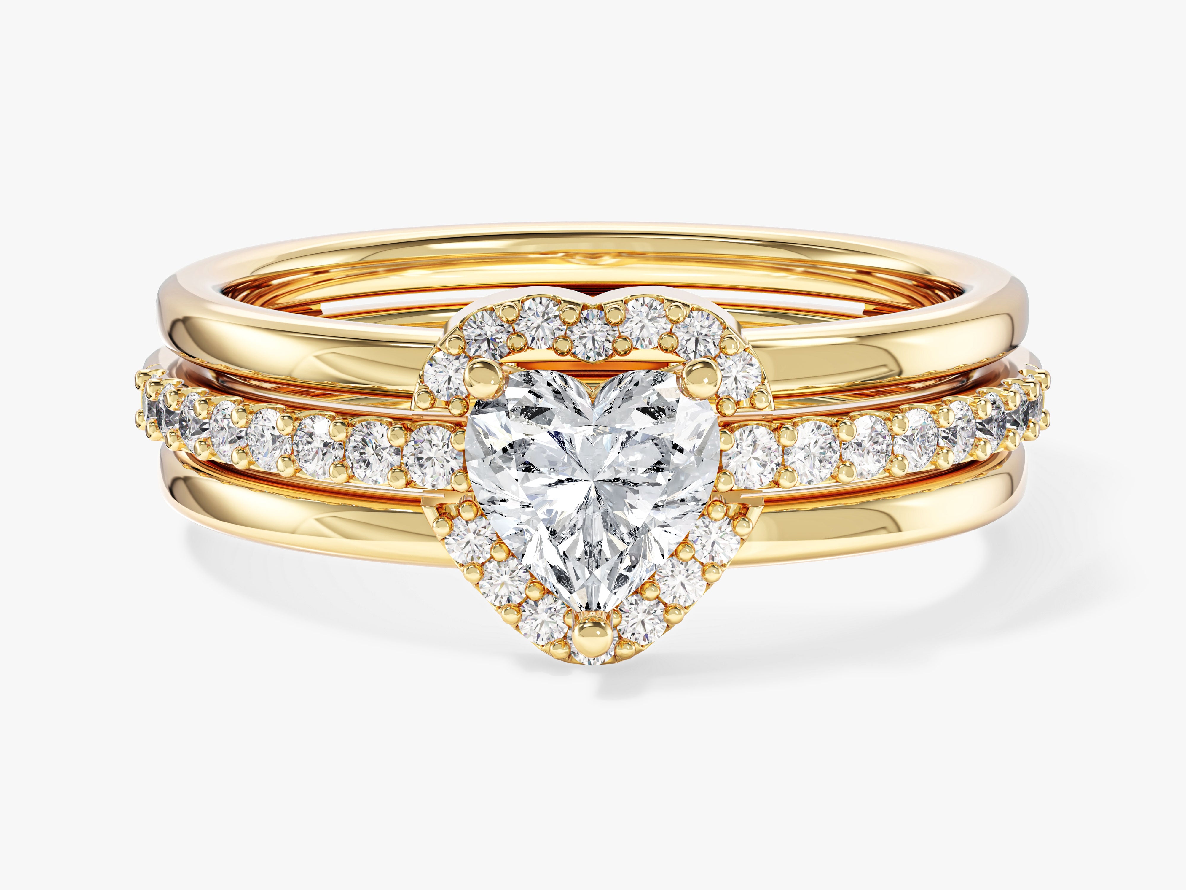Gold diamond engagement ring set with heart-shaped center stone