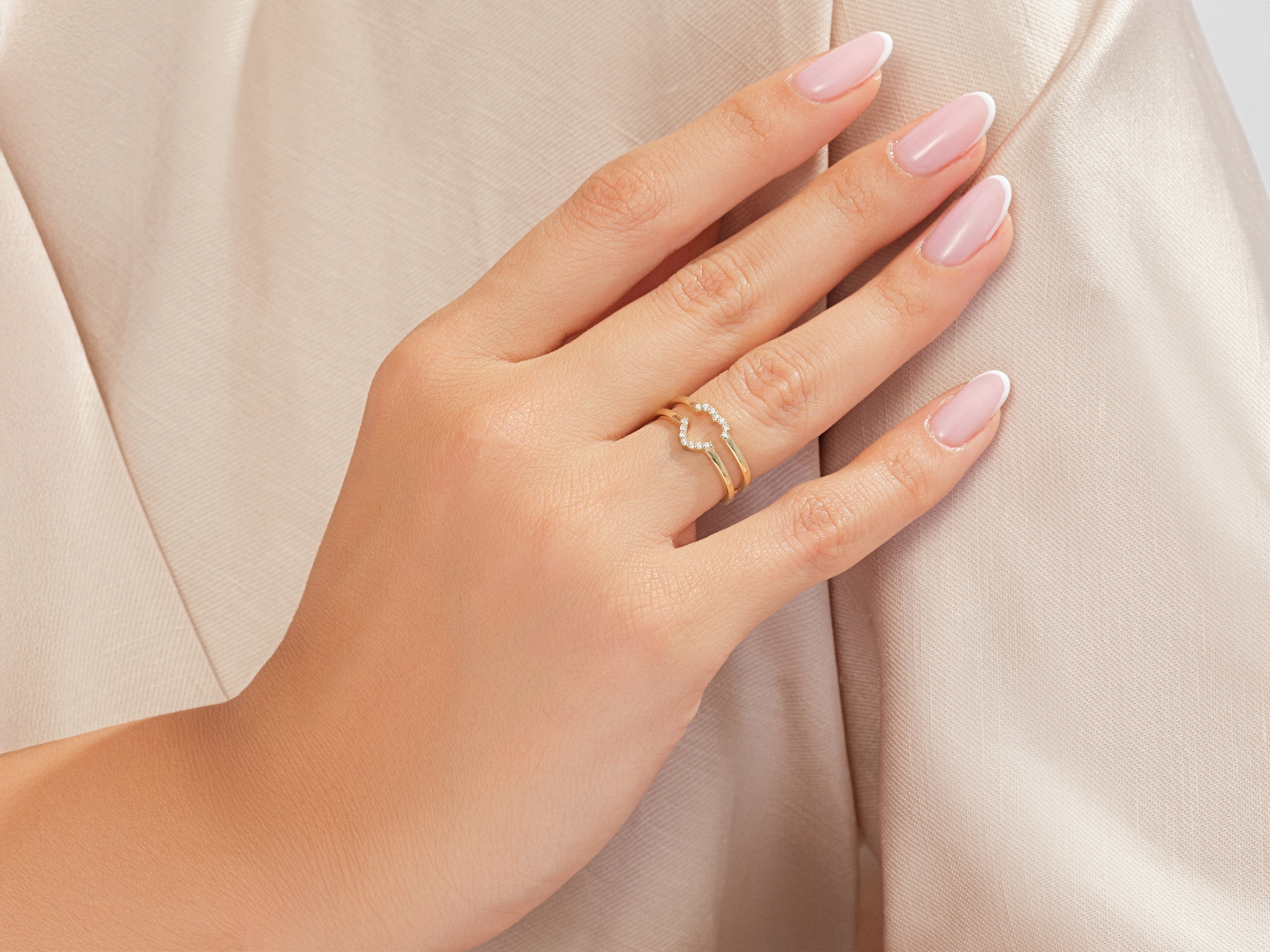 Diamond heart ring on a woman's hand, jewelry