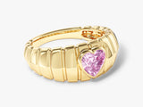 Gold ring with pink heart-shaped gemstone, jewelry design