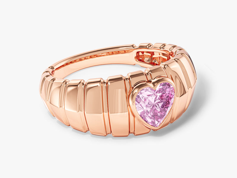 Rose gold ring with heart-shaped pink gemstone
