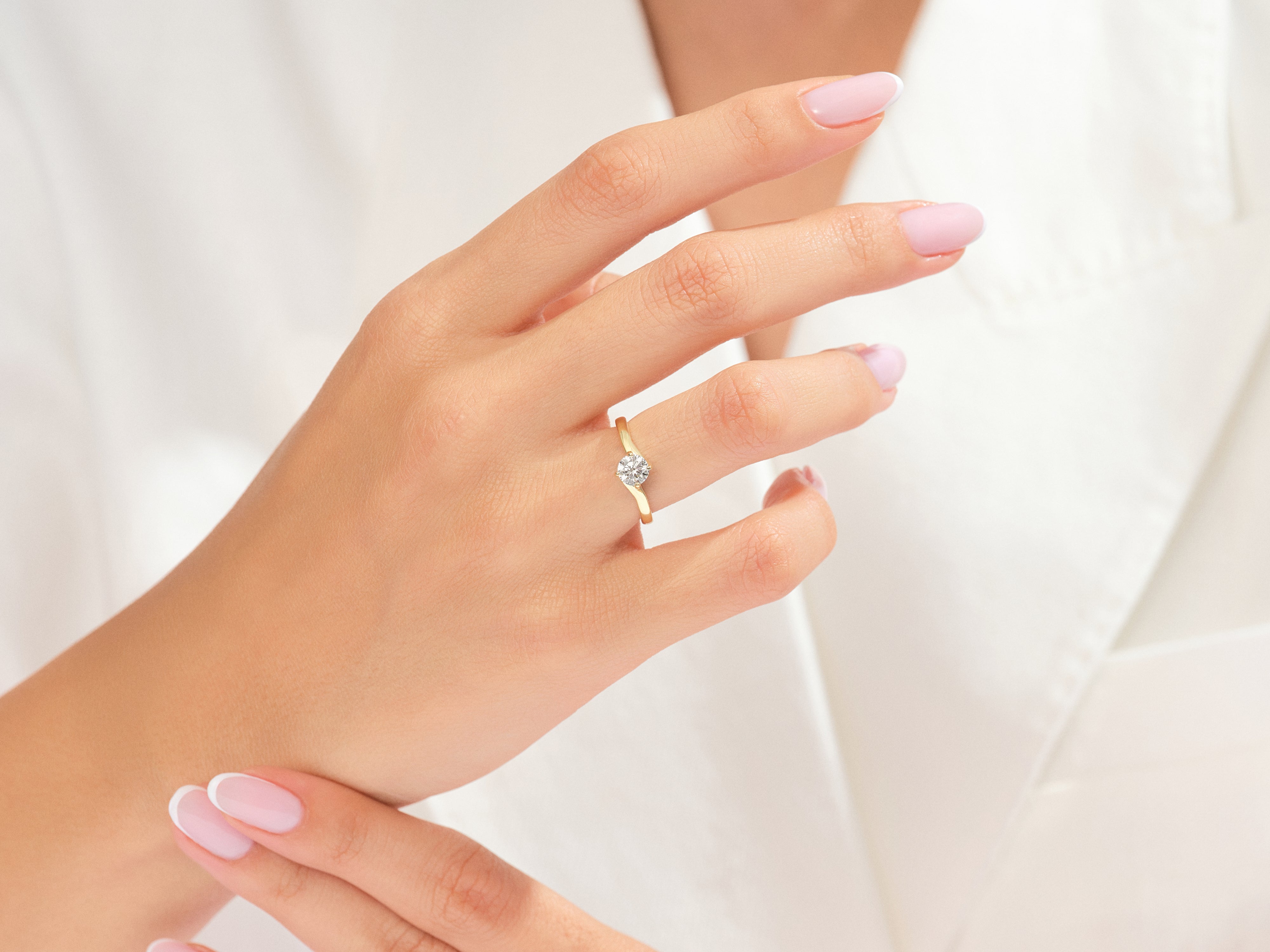 Diamond engagement ring on a woman's hand