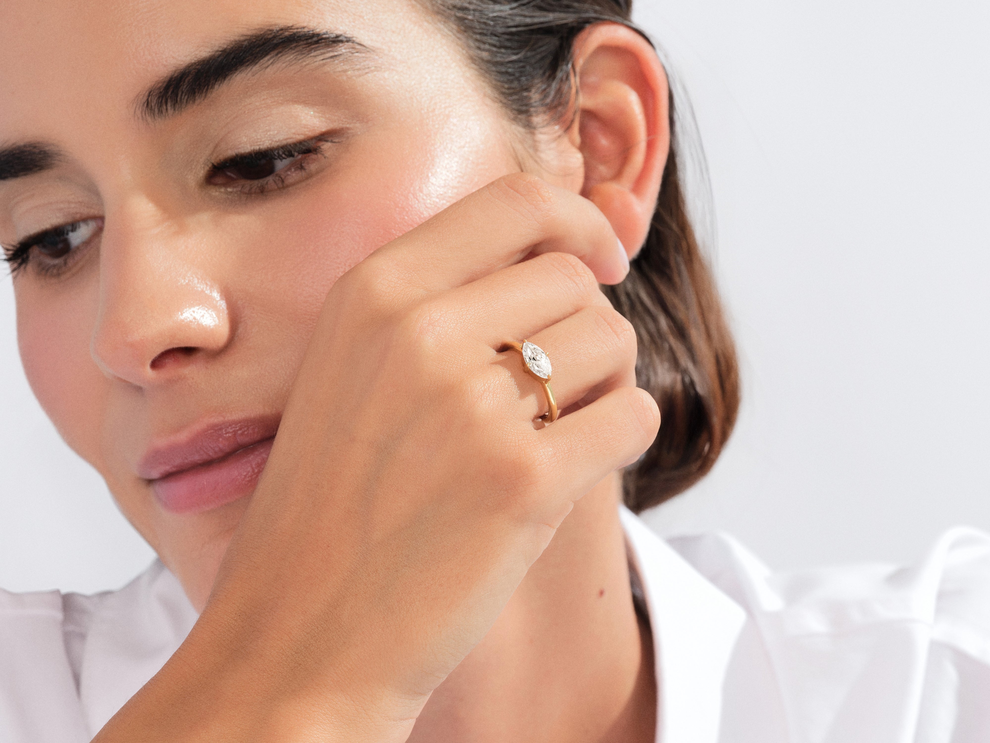 Solitaire East-West Moissanite Engagement Ring