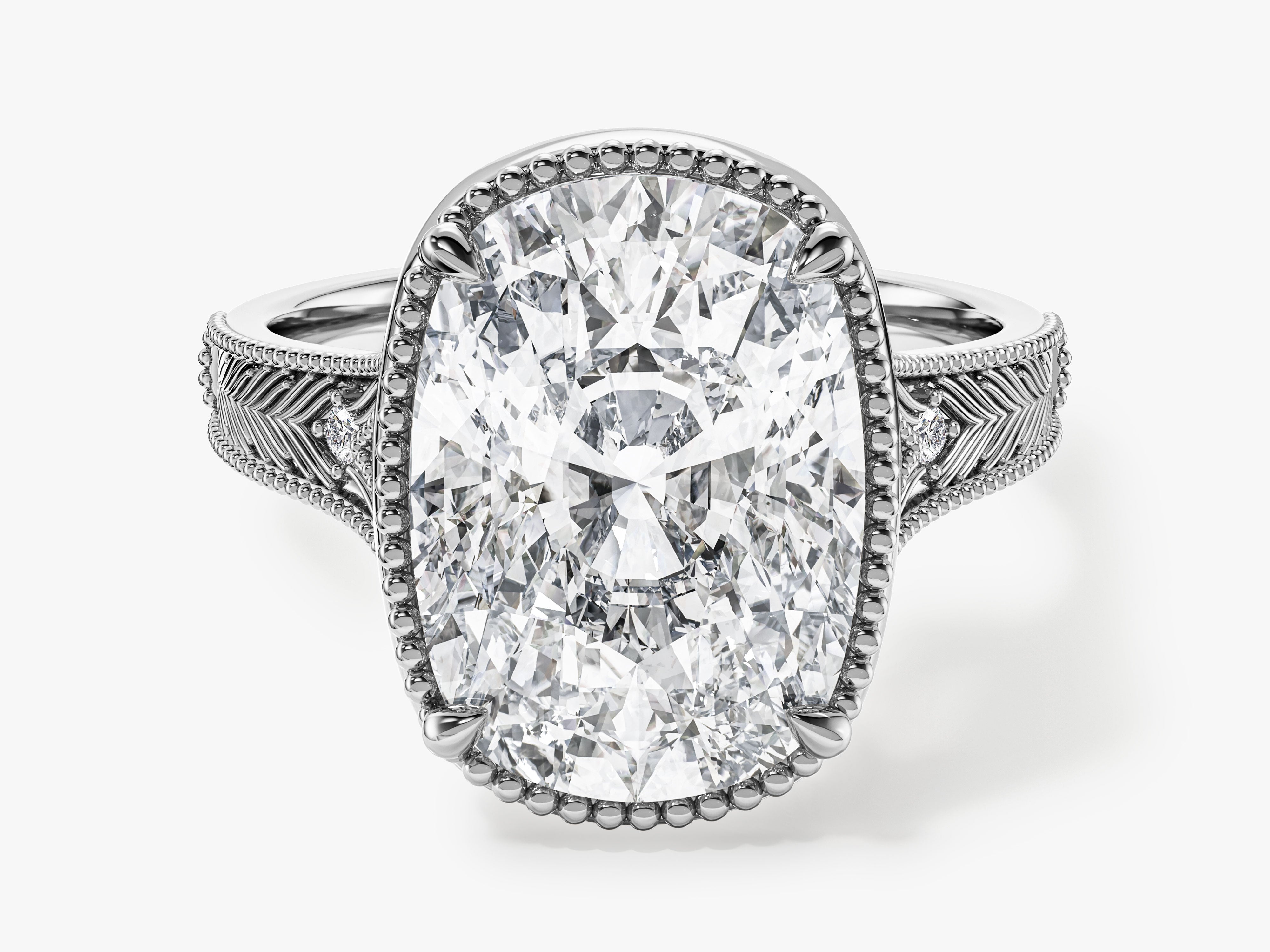Oval diamond engagement ring with intricate band details