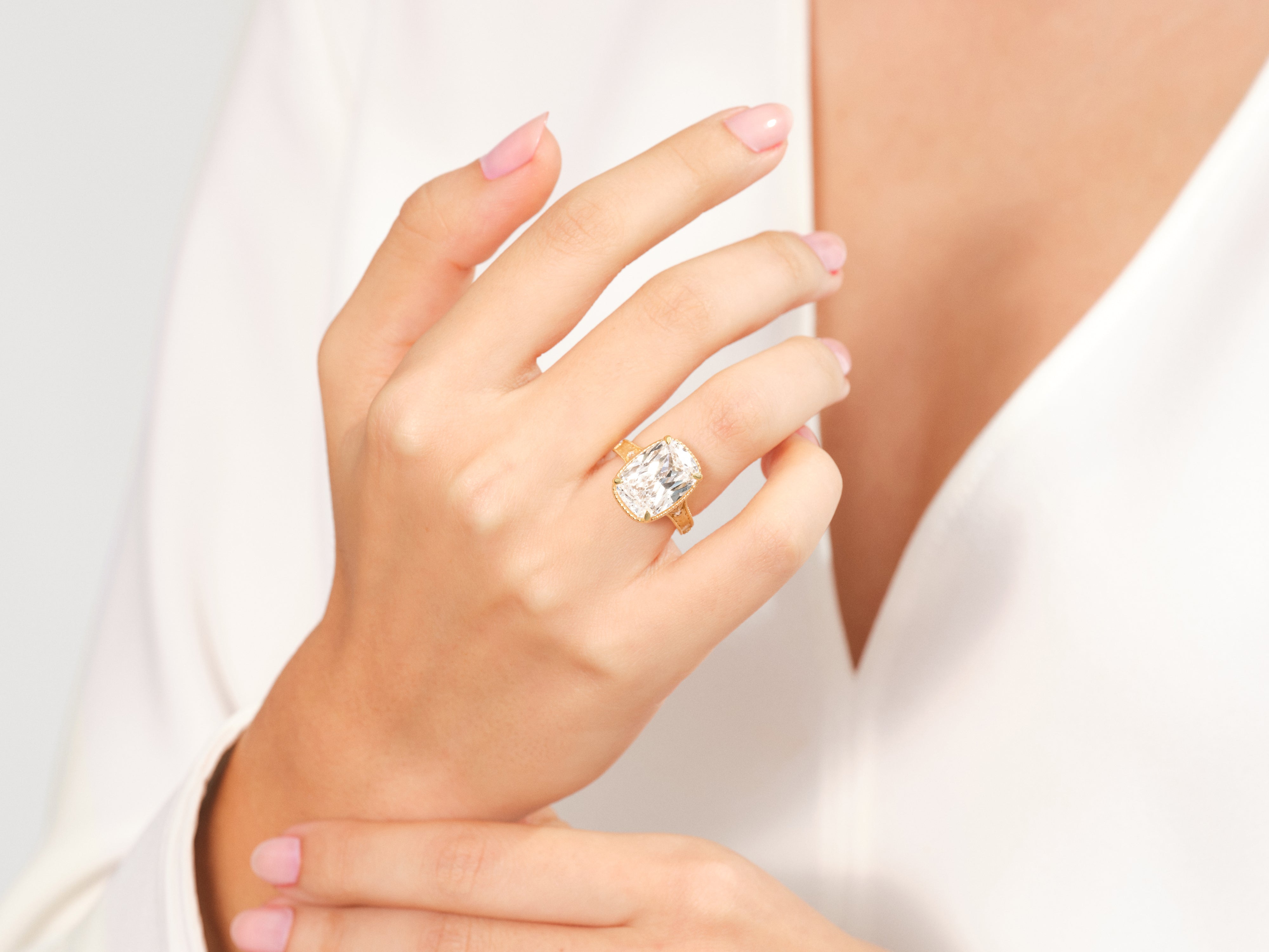 Diamond engagement ring on a woman's hand