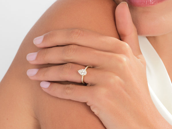 Sidestone Accent Pear Cut Lab Grown Diamond Engagement Ring