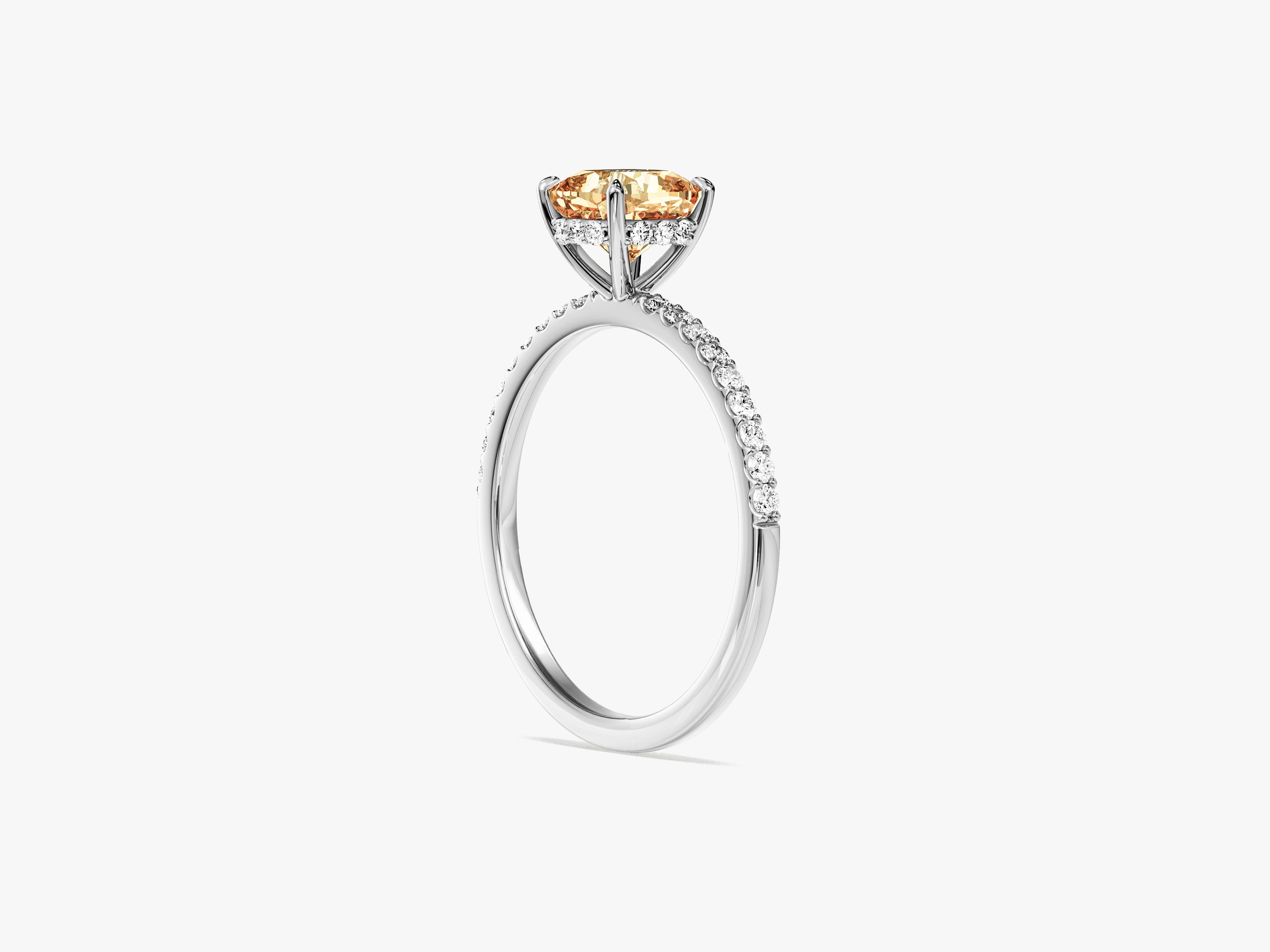 Sidestone Accent Gemstone Engagement Ring