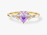 Sidestone Accent Pear Gemstone Engagement Ring