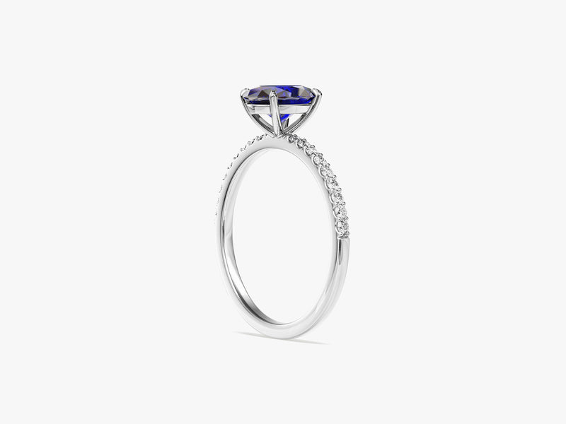 Sidestone Accent Oval Gemstone Engagement Ring