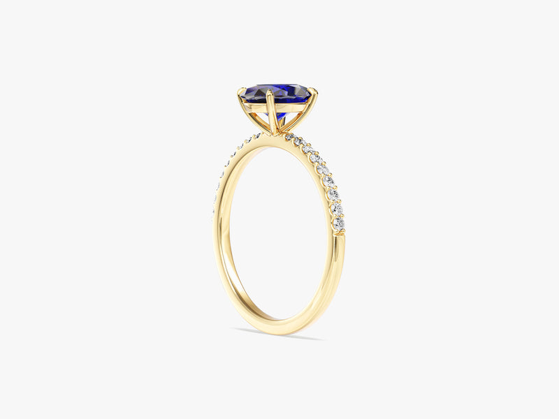 Sidestone Accent Oval Gemstone Engagement Ring