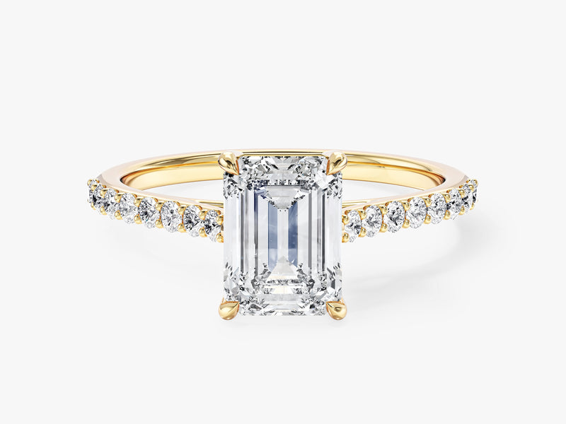 Sidestone Accent Emerald Cut Moissanite Engagement Ring