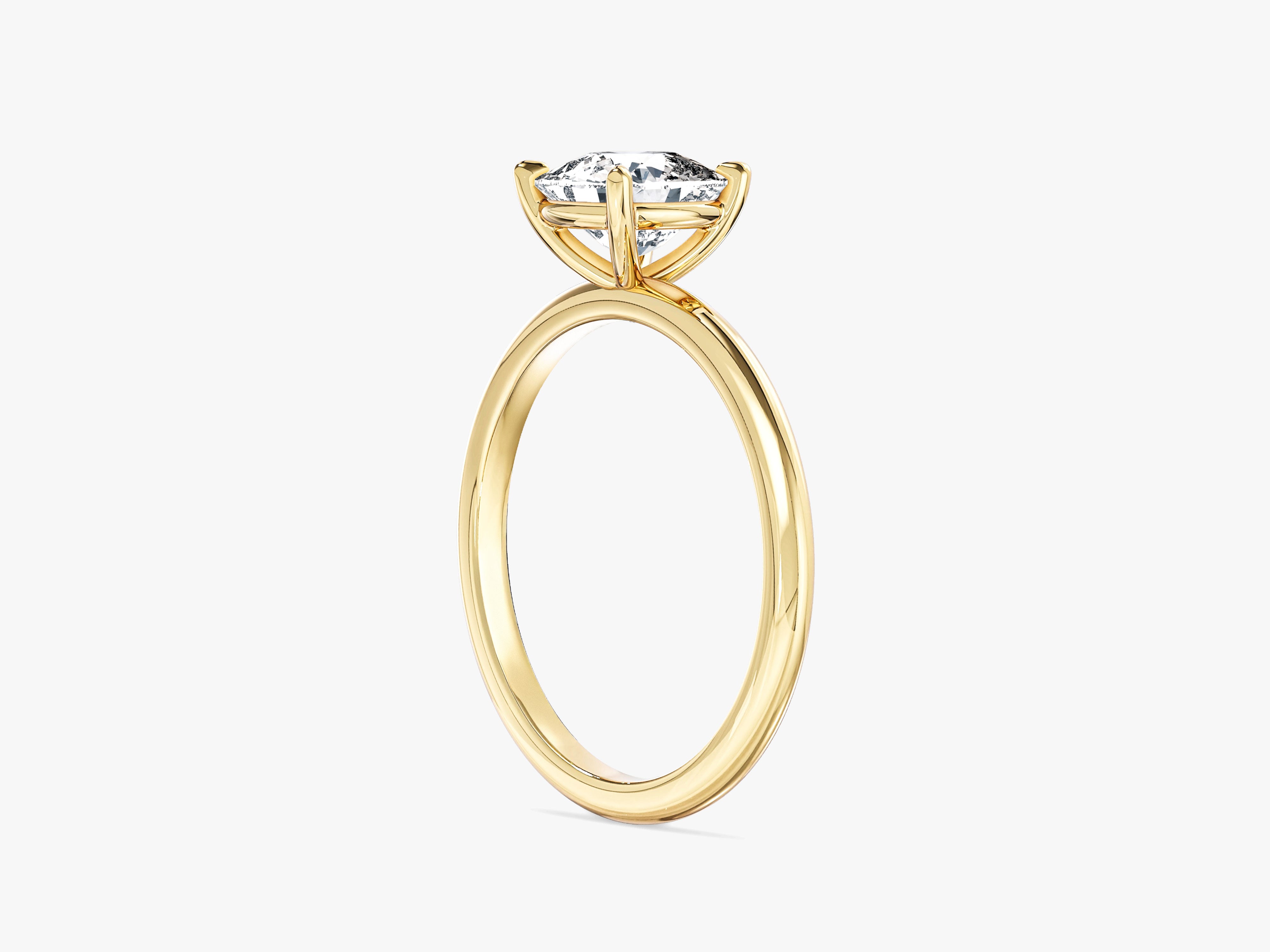 Gold ring with a cushion-cut diamond, fine jewelry