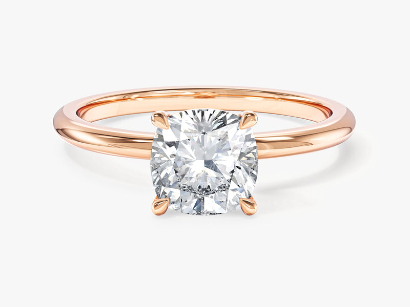 Rose gold engagement ring with cushion cut diamond