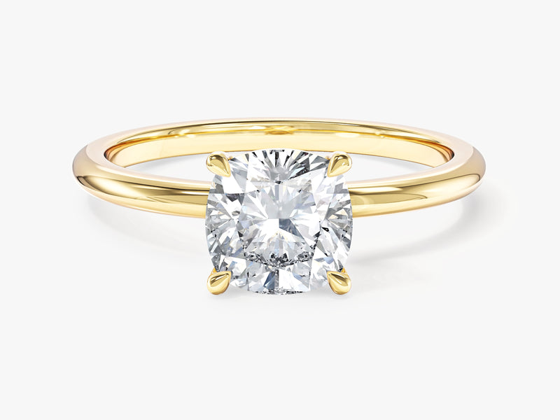Gold ring with cushion cut diamond engagement ring