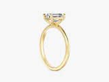 Emerald cut diamond engagement ring in yellow gold