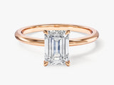Emerald cut diamond ring in rose gold setting