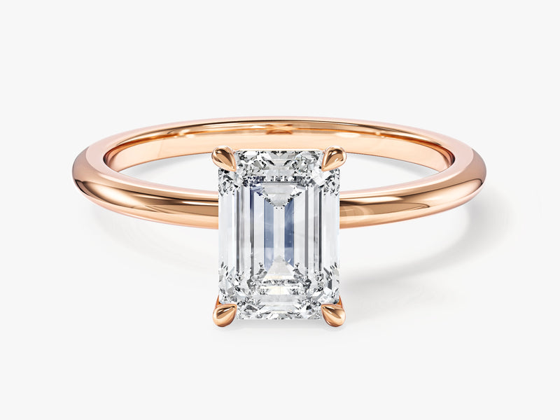 Emerald cut diamond ring in rose gold setting