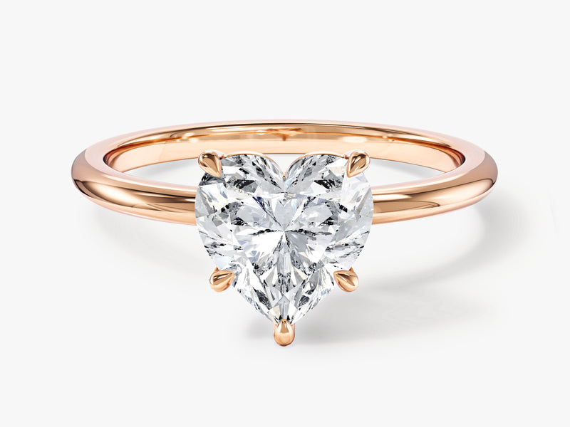 Rose gold ring with heart-shaped diamond engagement ring