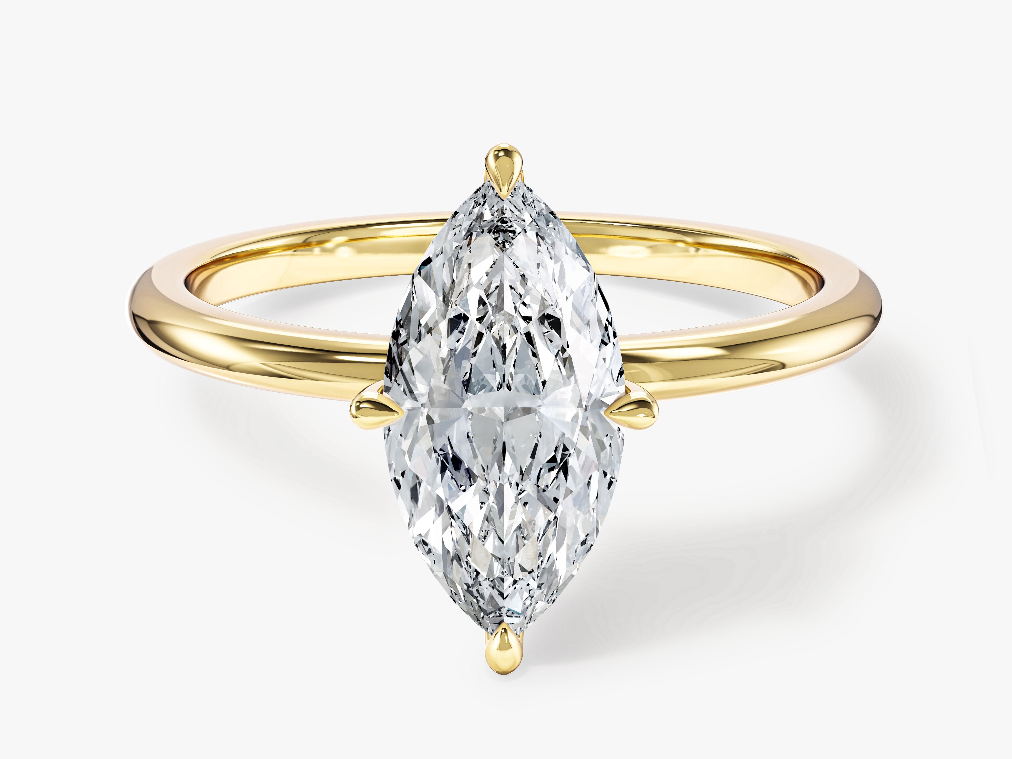 Marquise diamond engagement ring in yellow gold