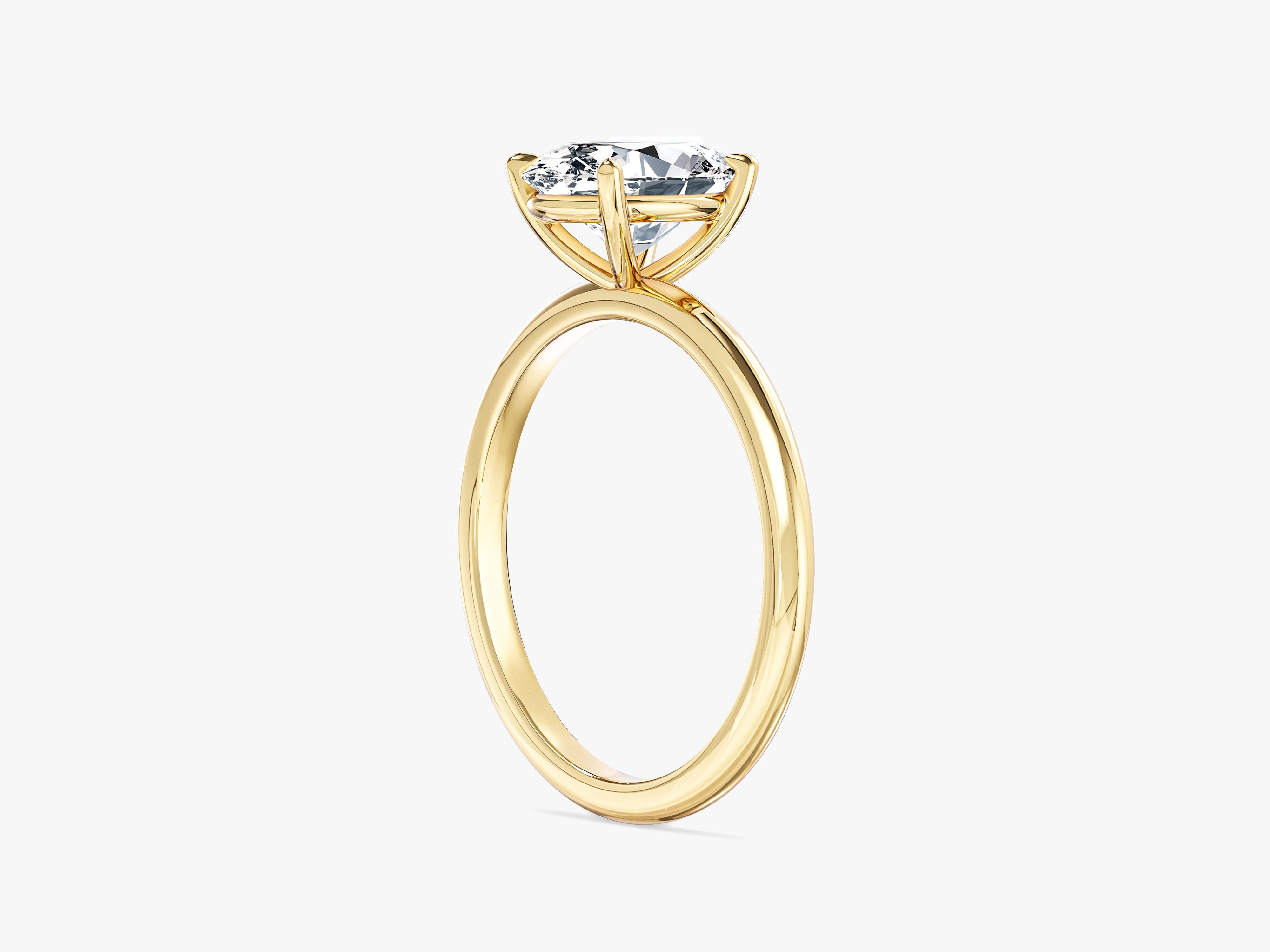Gold oval diamond engagement ring for jewelry company