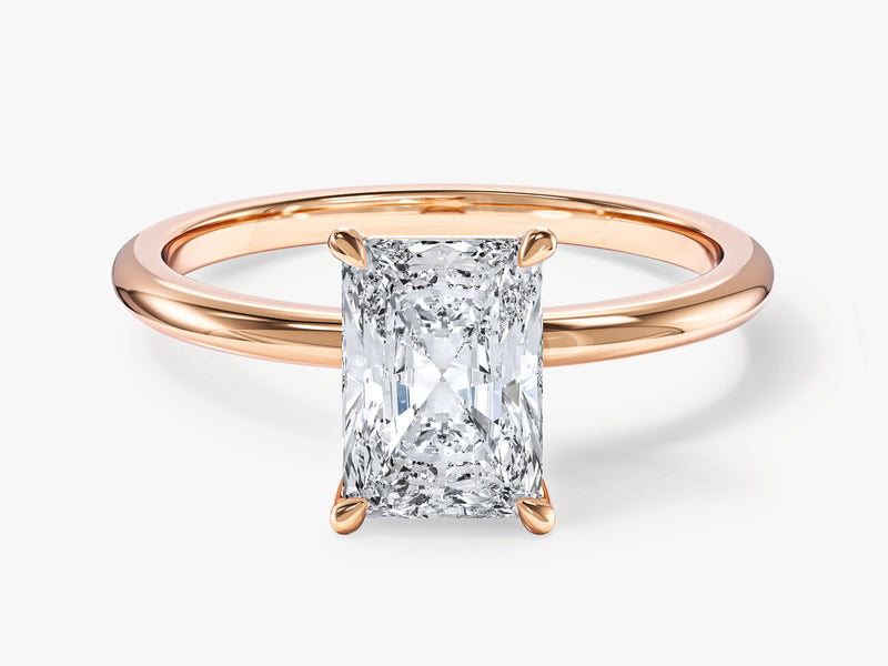 Radiant cut diamond engagement ring in rose gold setting