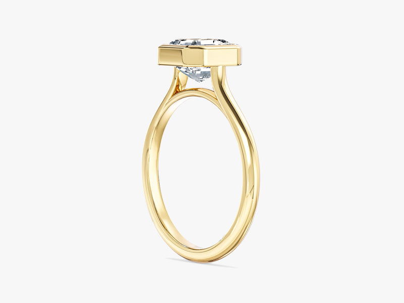 Gold ring with a square-cut diamond solitaire setting