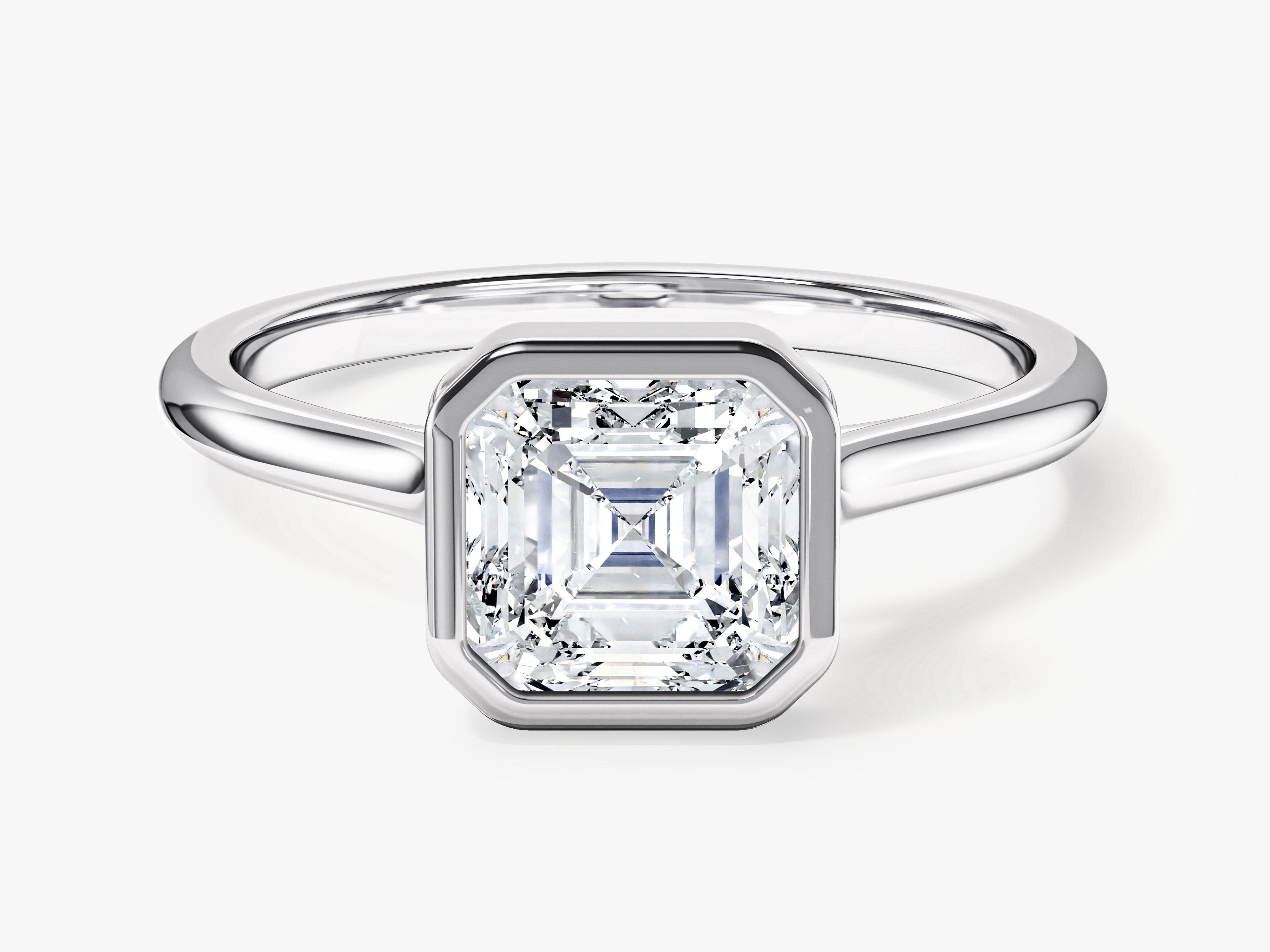 Emerald cut diamond ring with bezel setting, fine jewelry