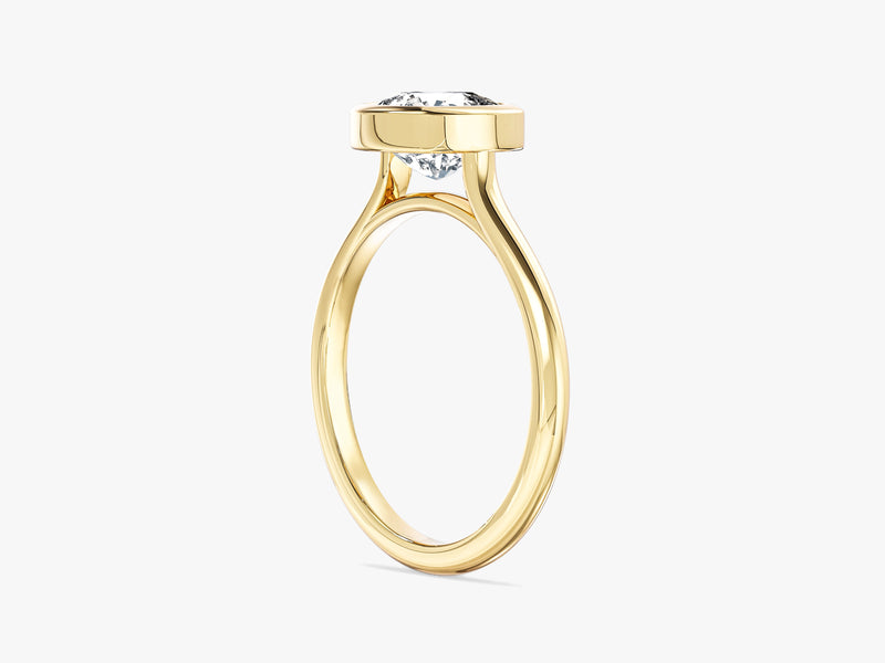 Gold ring with a bezel-set diamond, fine jewelry