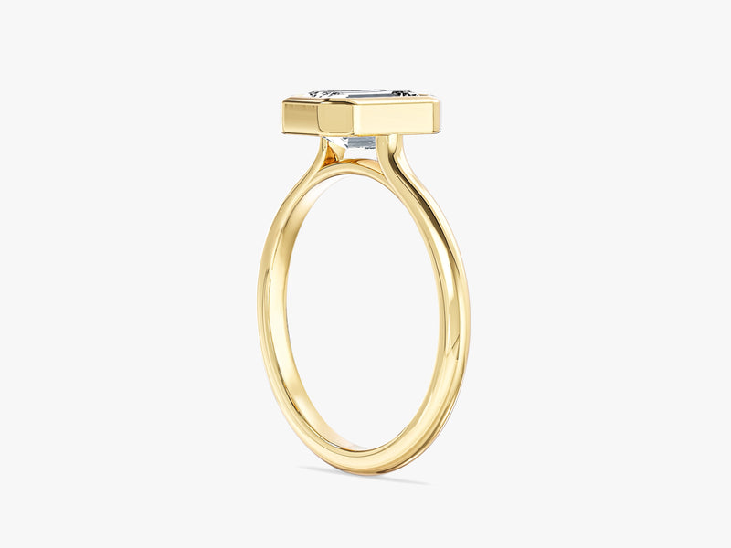 Gold ring with emerald cut diamond, fine jewelry